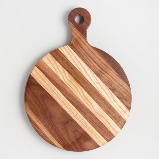 Small Round Walnut Wood Paddle Cutting Board
							var ensTmplname="Small Round Walnut Wood Padd... | World Market