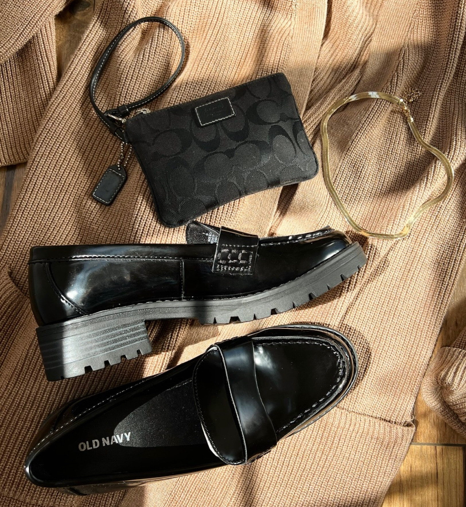 Penny loafers are the in shoe, this season for fall. I purchased this black patent leather pair with a chunky lug sole from Old Navy. 
They fit true to size. I’m a straight size 7 and these fit me perfectly and are comfortable too! 

fall shoes 
Shoe crush 
Fall shoe
Loafers 
Leather shoes 
Wristlets
Coach
Herringbone necklace 
Gold necklace 
Gold jewelry 

#LTKshoecrush #LTKSeasonal #LTKstyletip