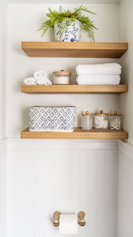 Bathroom accessories, coastal style, home decor, floating shelves, glass containers, white towels

#LTKFamily #LTKHome