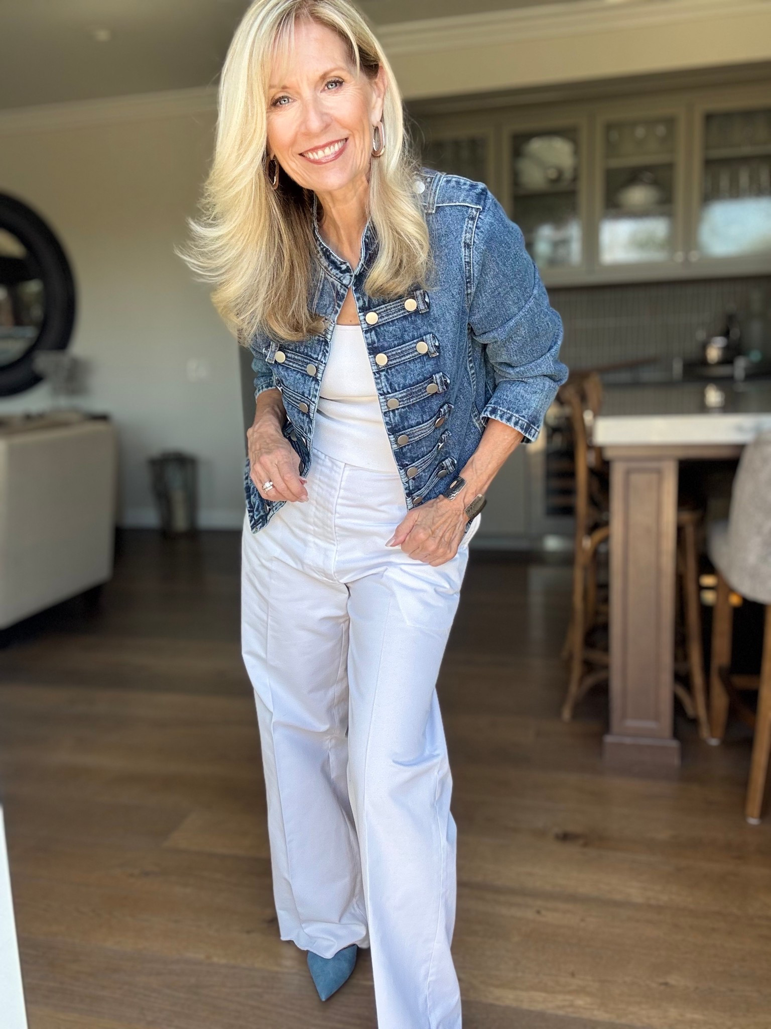 The Military Jacket - How to Style Spring 2026 Trends for 60+

The final week of how to wear the trends as a pro-age woman 60+.

I always love a good denim jacket and this one really took me over because of the military style. I love the mandarin collar and the style of buttons down the front which is so true to the military style details.

This incredibly affordable piece is such a fresh new way to wear a denim jacket. There’s something about taking all this detail and styling it with a simple pair of white pants and a white tank top.

Tell me in the caption if you like this look.

DM me with any of your style questions.

I’ve always been a huge fan of trends ever since I worked at Nordstrom doing their fashion shows. (Don’t get me wrong I love the classics and my basics.)

The trends just give me that creative way to fly. You don’t need to get every single one that’s out there this season. Just a couple that resonate with you. Then maybe I can inspire you, my friend, that pro-age woman on how to style them.

What do you think of the Military Style Jacket?

Follow me for more 50+ style inspiration.

#LTKOver40 #LTKootd