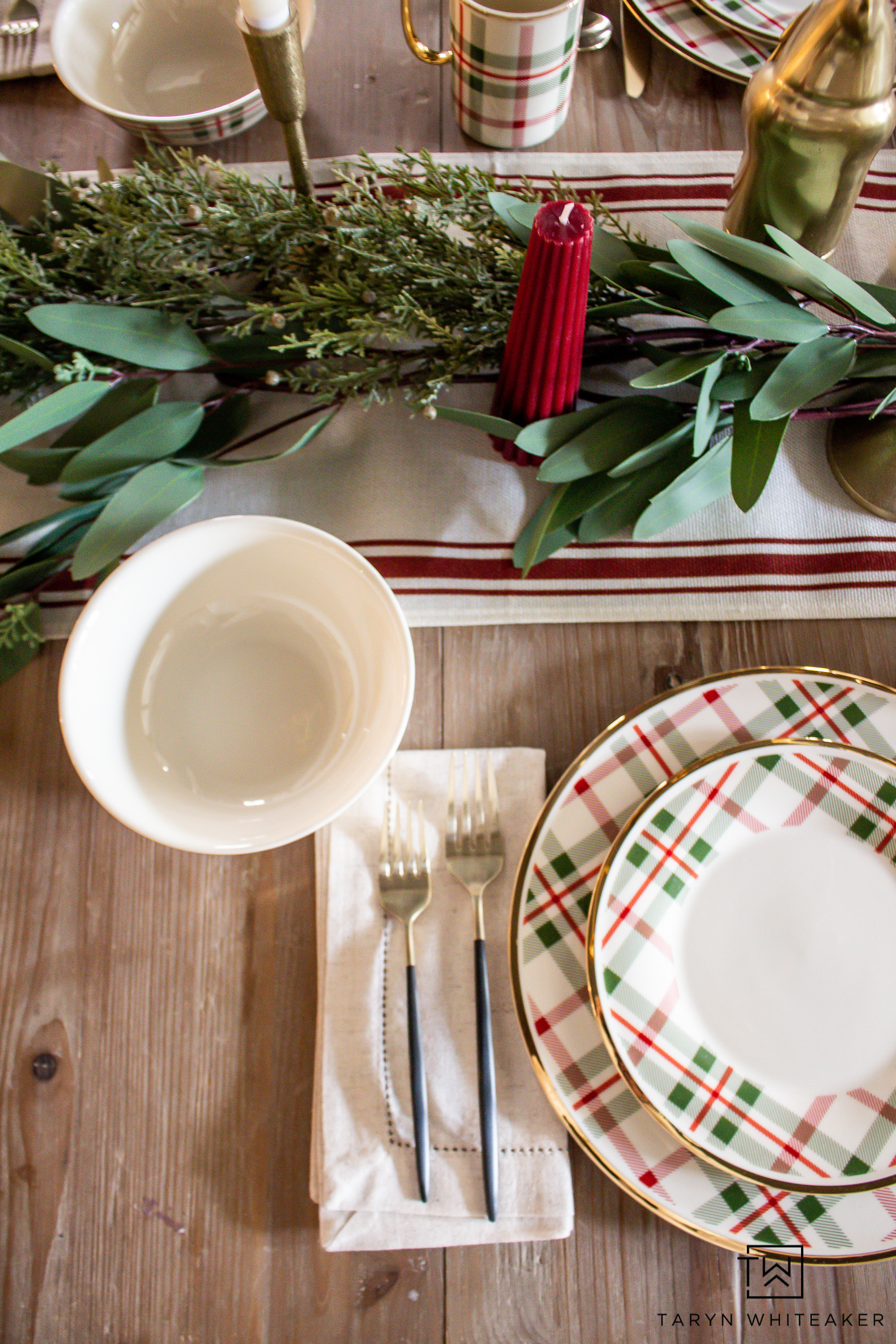 A simple holiday table that feels warm, inviting, and easy to recreate. Layered plaid plates, natural greenery, candles, and gold accents create the perfect mix of festive and cozy for gatherings of any size.

holiday tablescape, christmas table decor, holiday hosting ideas, plaid dinnerware, festive table setting, christmas table inspiration, holiday home decor

#LTKSeasonal #LTKHome #LTKHoliday
