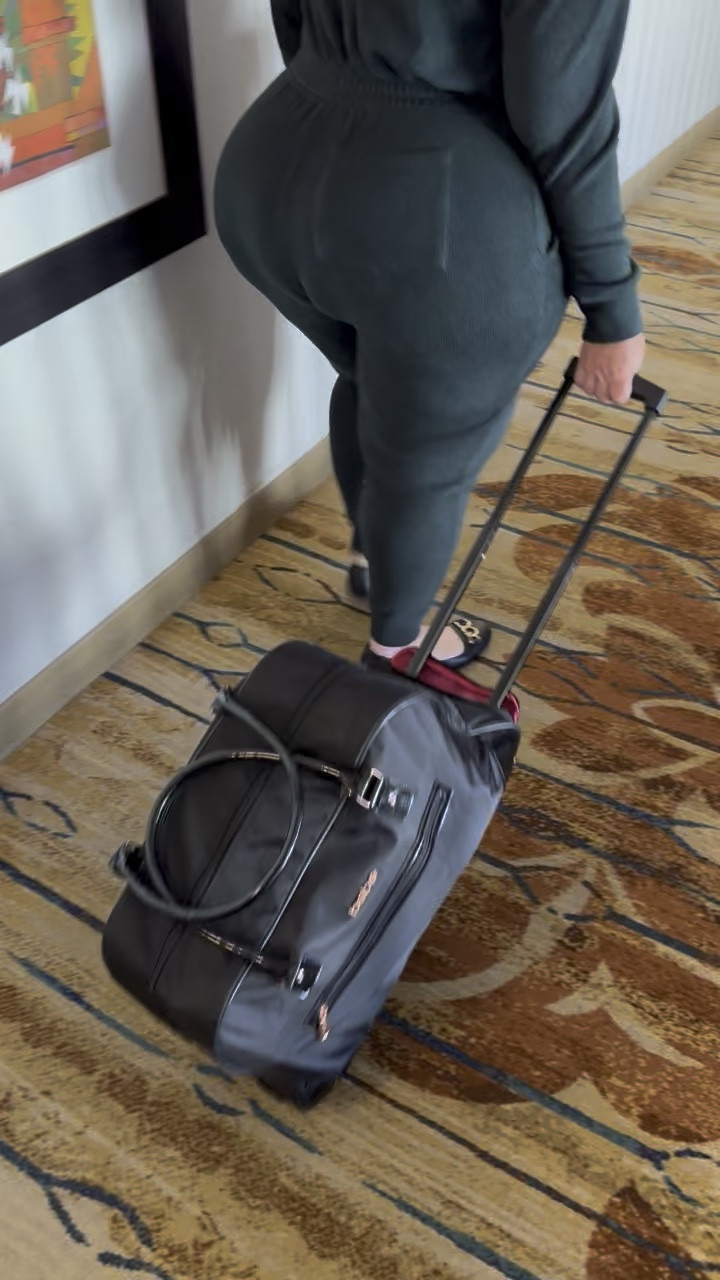 Plus Size Travel made easier with this rolling travel bag by Bebe. Love this Black with rose gold trim and hot pink lining. Jumpsuit runs in an inclusive size range and ballet flats are by Dr Scholl’s. Fun fact - my Dad owned a Dr Scholl’s shoe shop for 35 years. (PS - this video was shot back in March 2024 when my inflammation was much higher.) #traveltuesday #tuesdaytravels

#LTKPlusSize #LTKItBag #LTKTravel