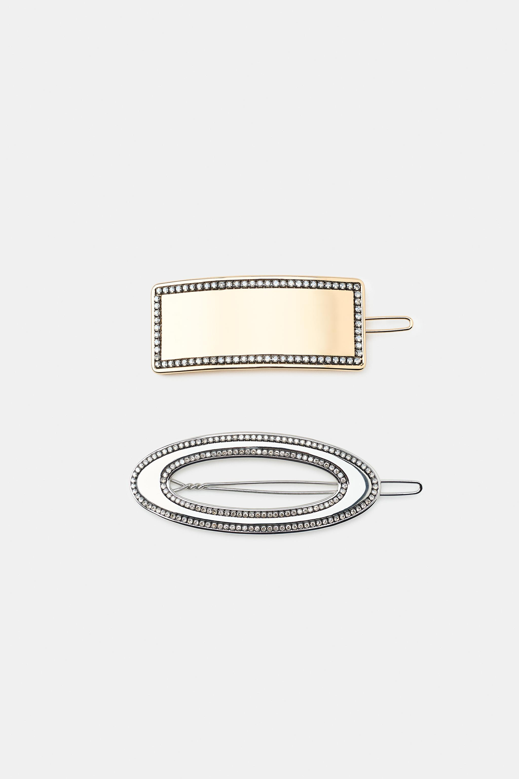 Pack of two metallic clip-style hair pins in geometric shapes. Contrast rhinestone appliqu\u00e9. | Zara DE
