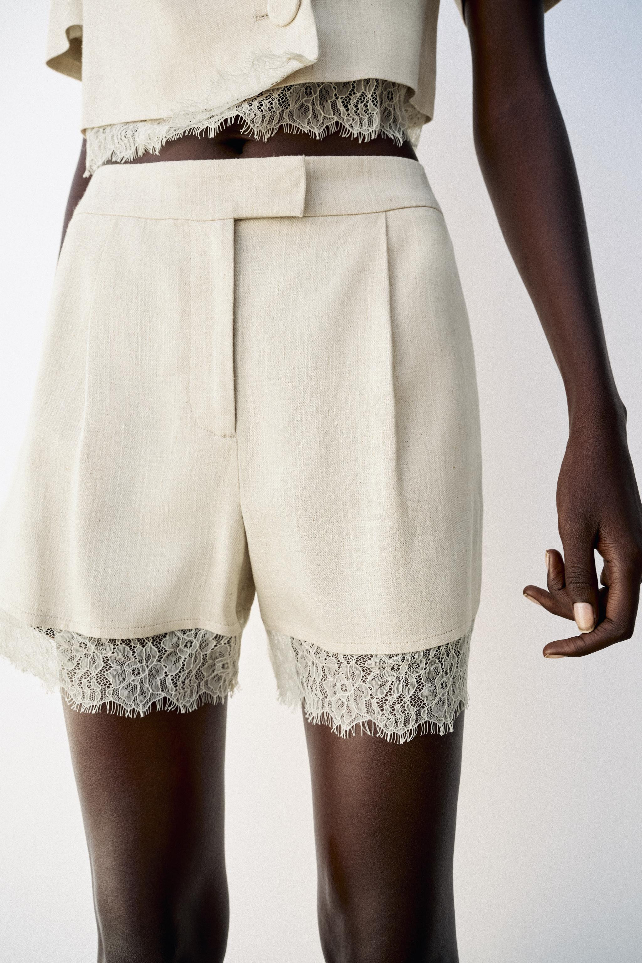 High-waisted shorts with front pleats. Front pockets and back false welt pockets. Hem finished wi... | Zara US