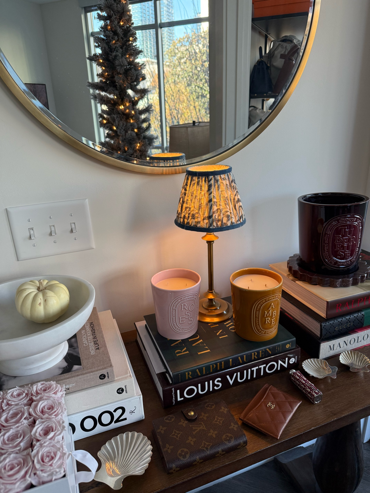 Coffee table books, roses, lamp, diptyque candles



#LTKHome #LTKHoliday #LTKSeasonal