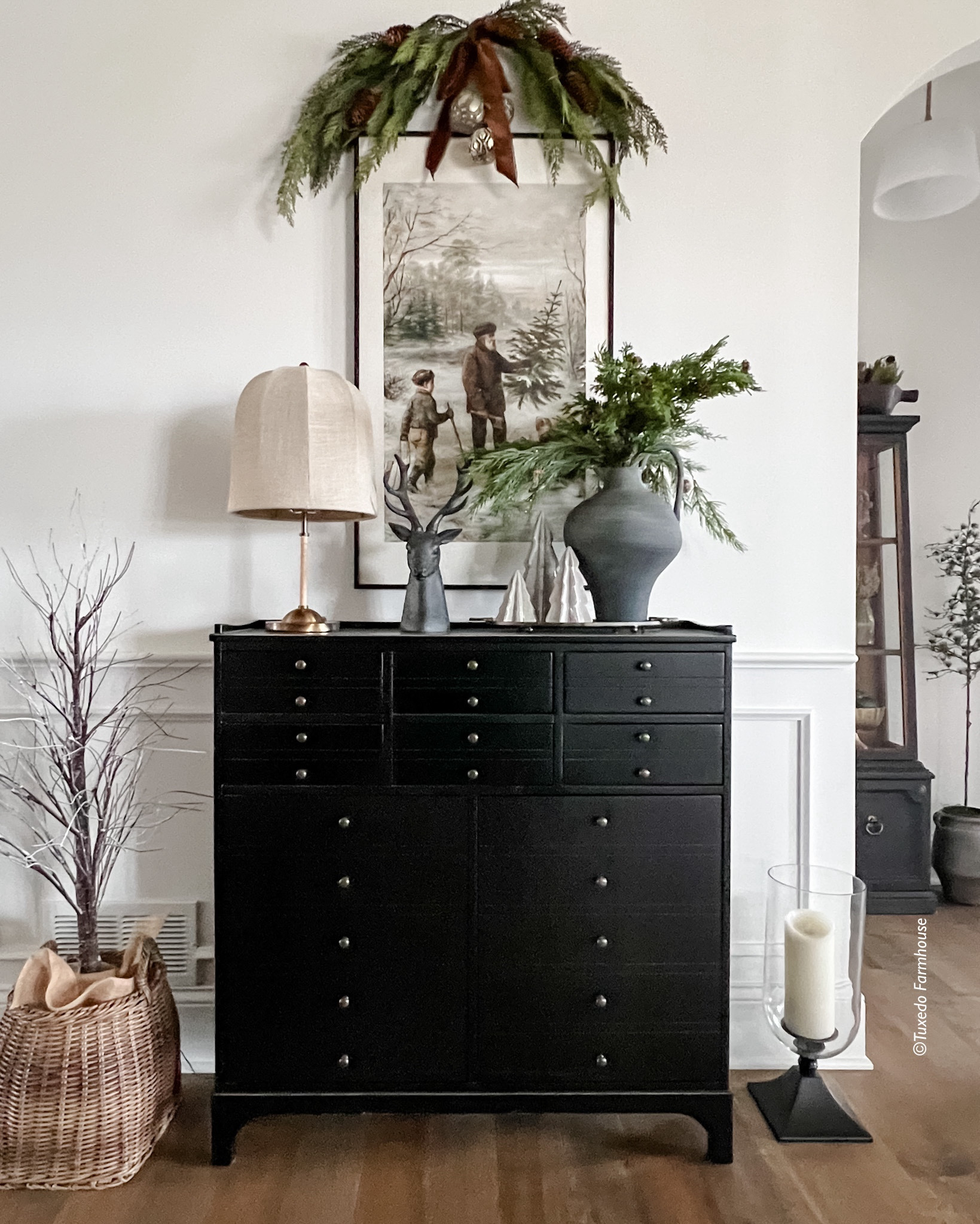 A swag over a holiday print is a fun way to jazz up a wall. My apothecary cabinet is on sale! Still a fav piece of mine  

#LTKSeasonal #LTKHome #LTKHoliday