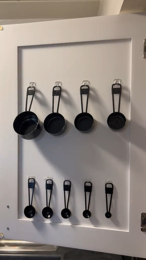 Hearth & Hand with Magnolia measuring cup cabinet organization using command hooks

#LTKhome