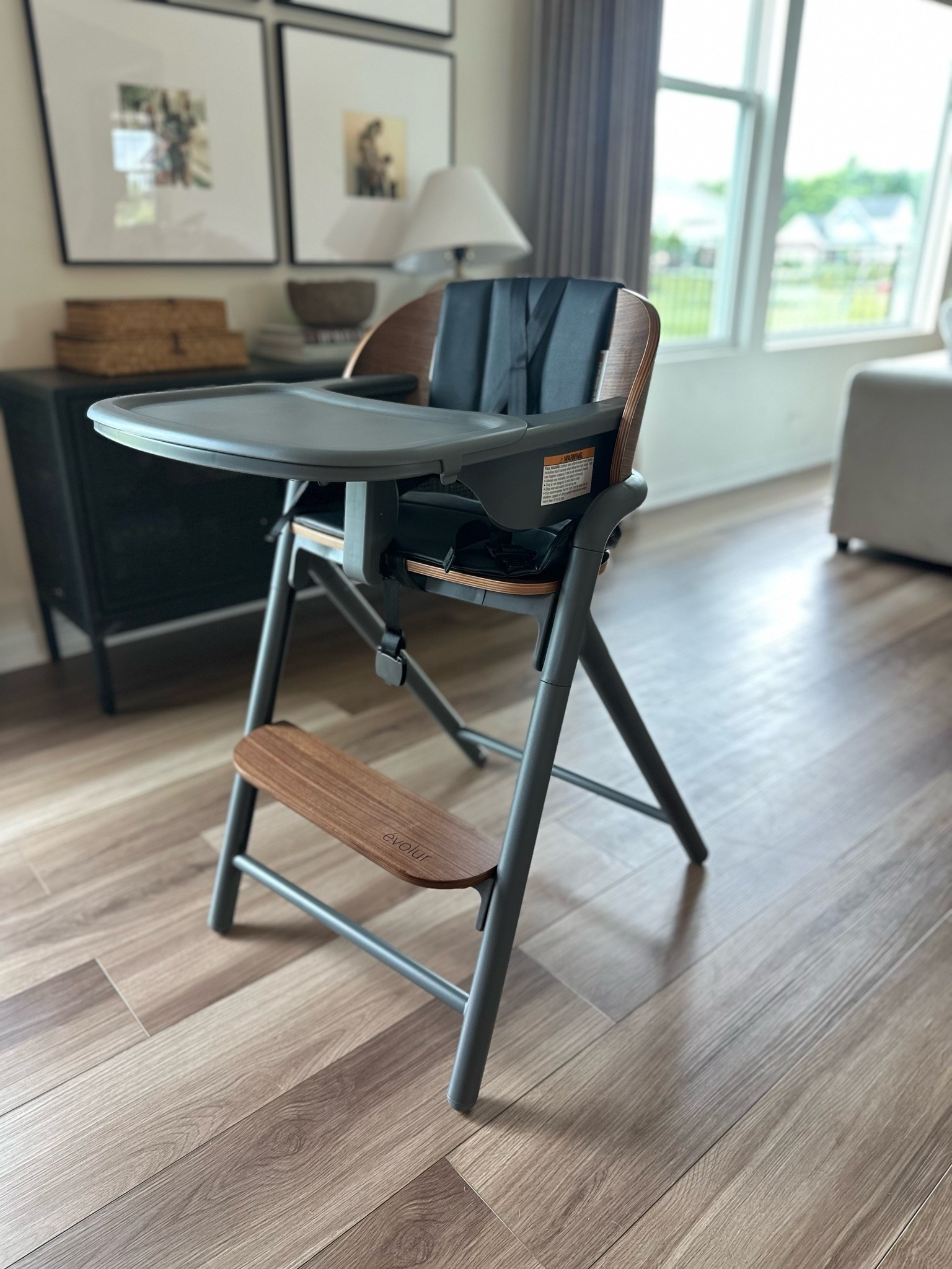 Adjustable high chair that grows with your baby! Easy to clean, AND aesthetic?! Look at that wood tone 🤩

#LTKmomlife #LTKBaby