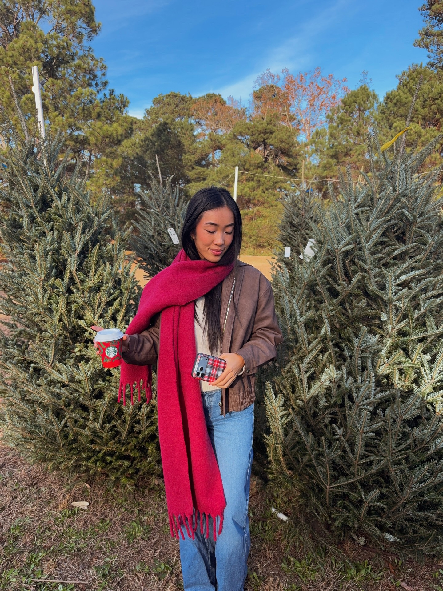 reaching flow state when I have a peppermint hot cocoa, Christmas phone case, and chunky scarf ready to go Christmas shopping 🎄🙂‍↔️

Grey bandit code BROOKETANG15
Wearing size medium in Uniqlo sweater 
.
Christmas tree pics, Christmas shopping outfit, chunky scarf outfit idea 

#LTKootd #LTKHoliday #LTKSeasonal