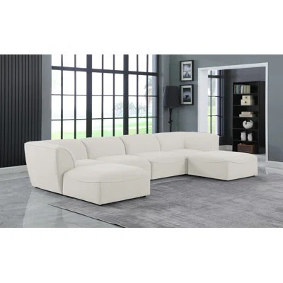 Callister 142" Wide Reversible Modular Corner Sectional with Ottoman | Wayfair North America
