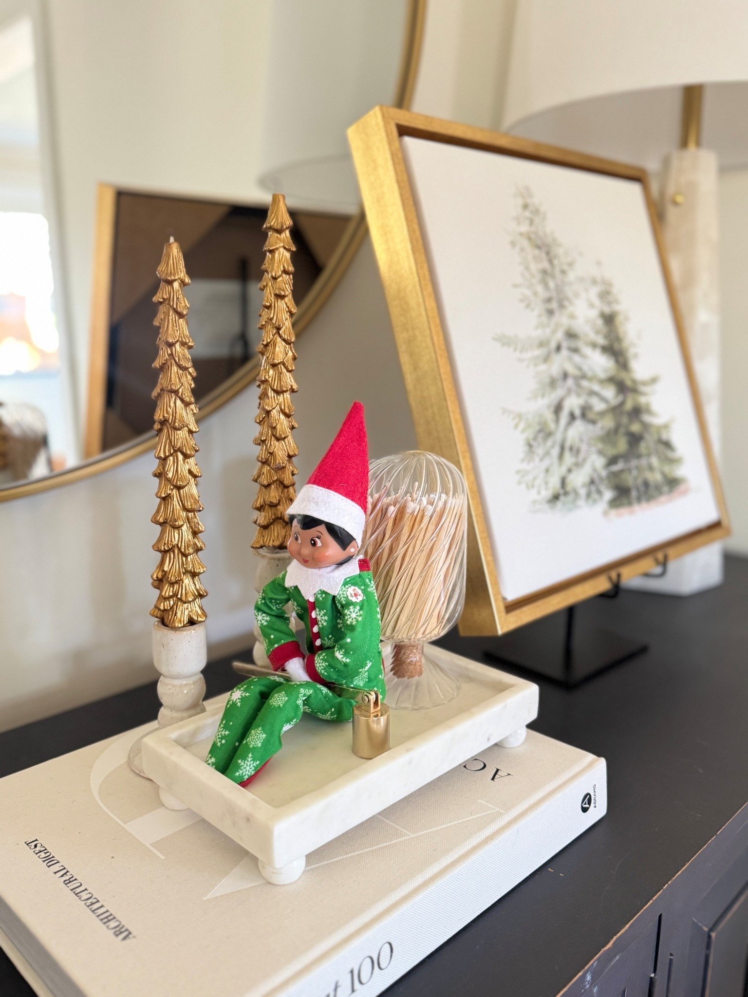 My Elf on the shelf is getting cheeky with our holiday decor 

#LTKHome #LTKmomlife #LTKHoliday