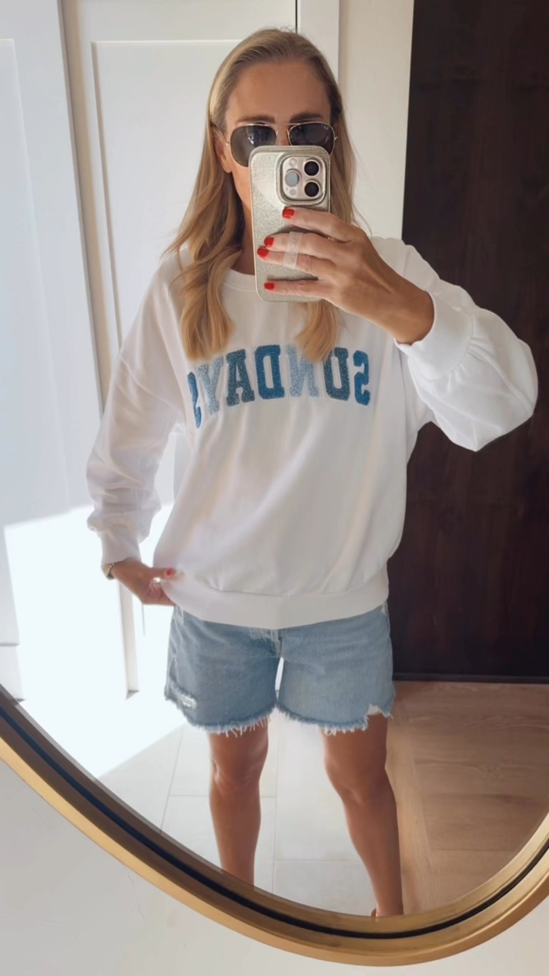Mom summer outfit, oversized sweatshirt, denim shorts  Case of the Sundays?  This will fix it😉. Sized up to medium for oversized look. Size 27/small 5’8”  

#LTKOver40 #LTKShoeCrush #LTKFindsUnder100