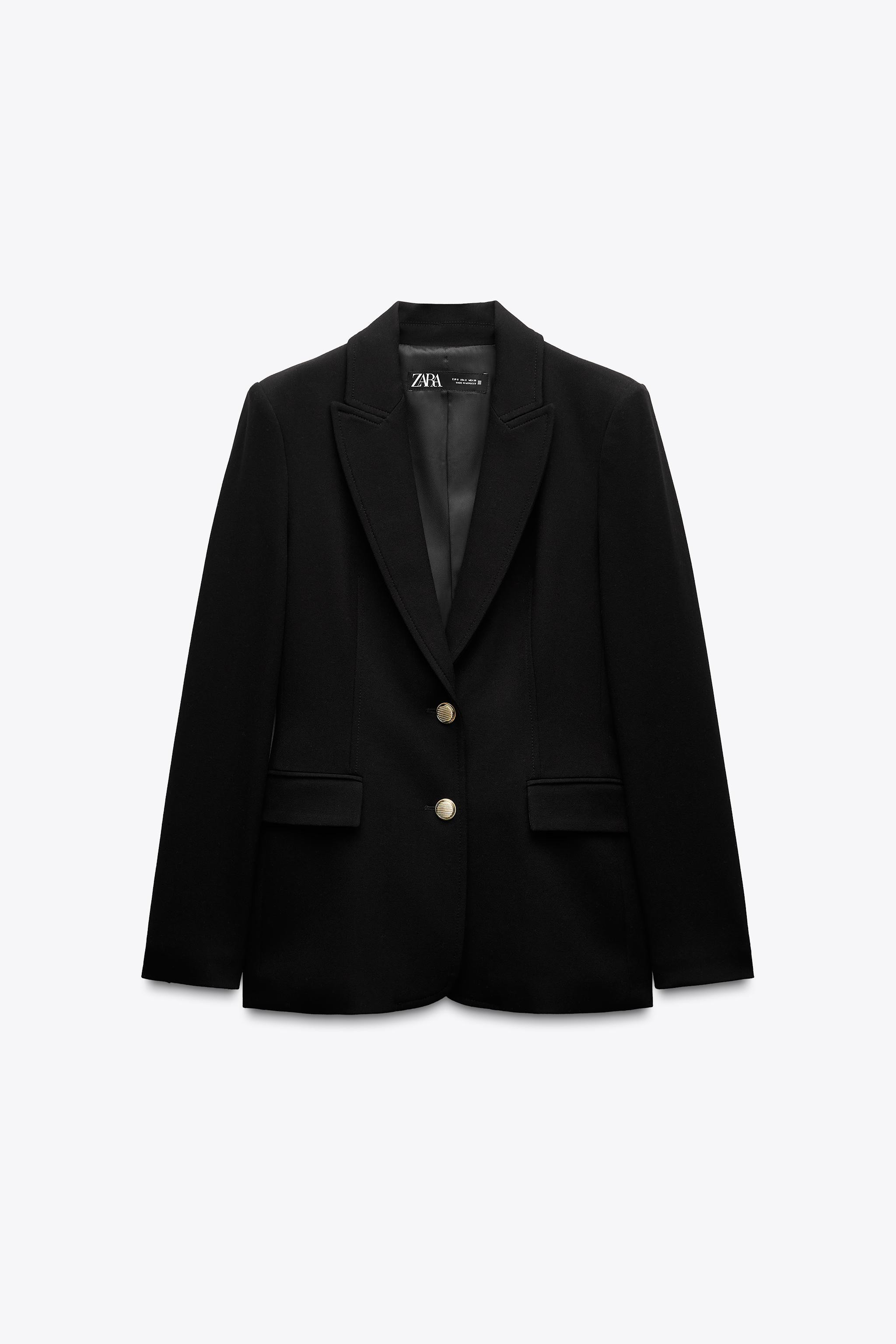 Fitted blazer with lapel collar and long sleeves with shoulder pads. Front flap pockets. Front go... | Zara US