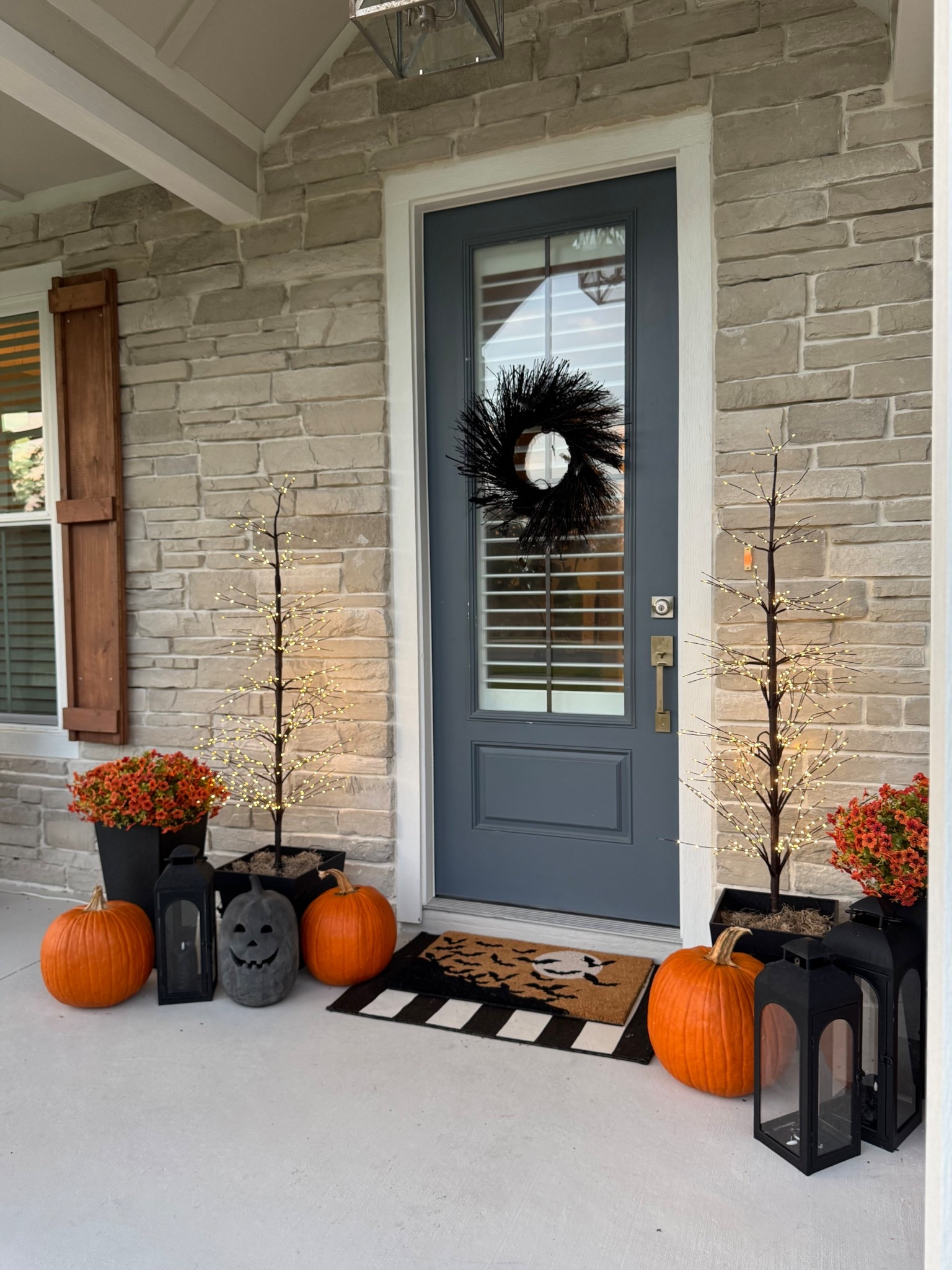 
I kept my front porch simple yet spooky this year, re using all of my decor from years prior 🙌🏼

A few facts about these pieces:
- faux mums- UV resistant and come in multiple colors. This is my 3rd year using them 
- pre lit twig trees- these are such a versatile investment- I leave mine out from September thru January, because they look amazing at Christmas time too! I’ve had these 2 years 
- lanterns- they give a classic and rimless look, and add extra flair with battery operated lights inside. I’ve had these 2 years 
- wreath- I’ve this for 4 years and it’s still going strong. PB doesn’t make this exact one anymore, but they do offer one similar. 


#LTKHome #LTKStyleTip #LTKSeasonal
