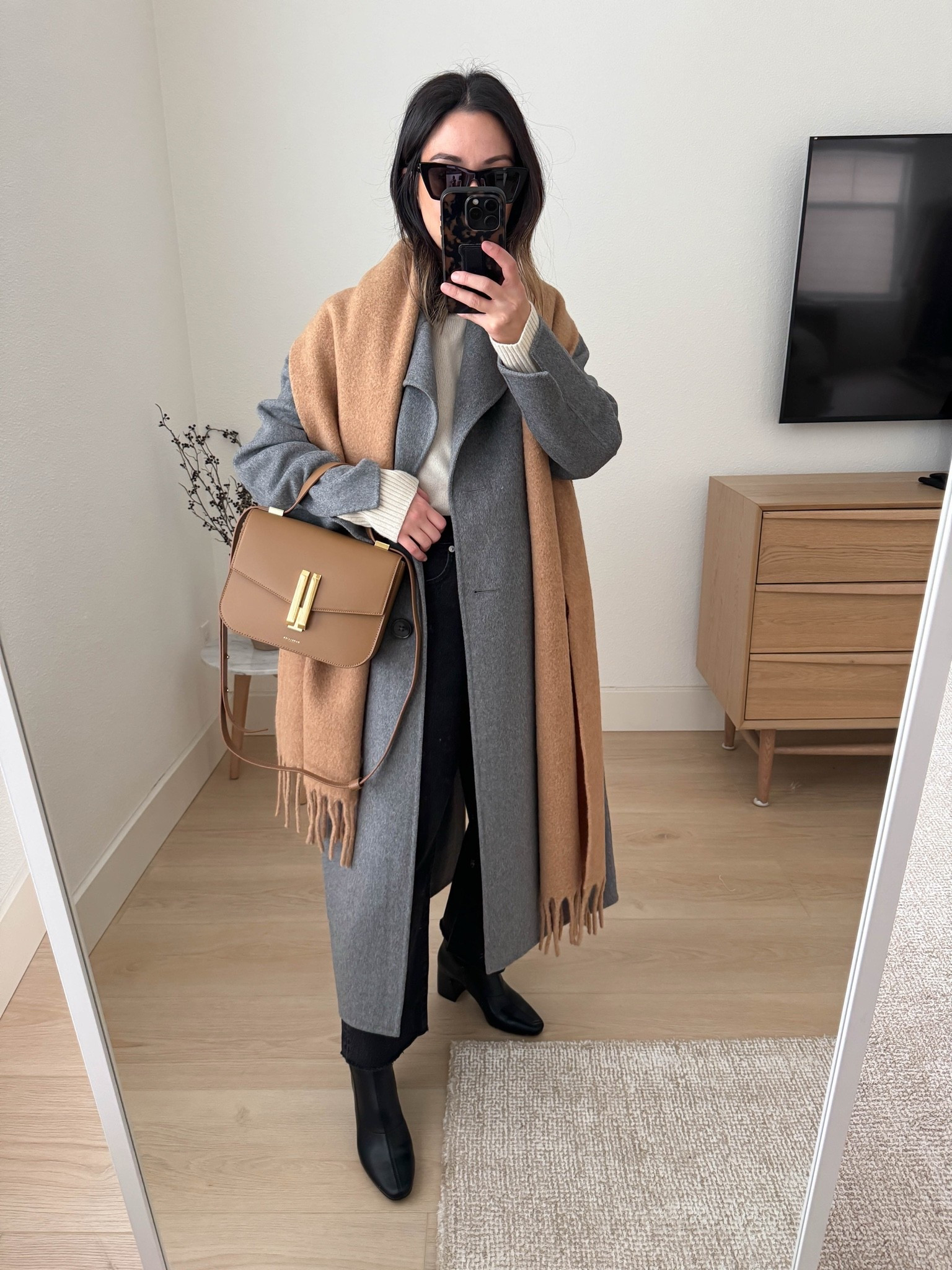 casual workwear idea with jeans. 

Banana Republic coat petite xs
Everlane sweater xs
Madewell jeans 25. Sized up cut hems (old)
Uniqlo scarf
DeMellier bag 
Donald Pliner Boots 5.5 (old)
YSL Sunglasses

#LTKootd #LTKWorkwear #LTKOver40