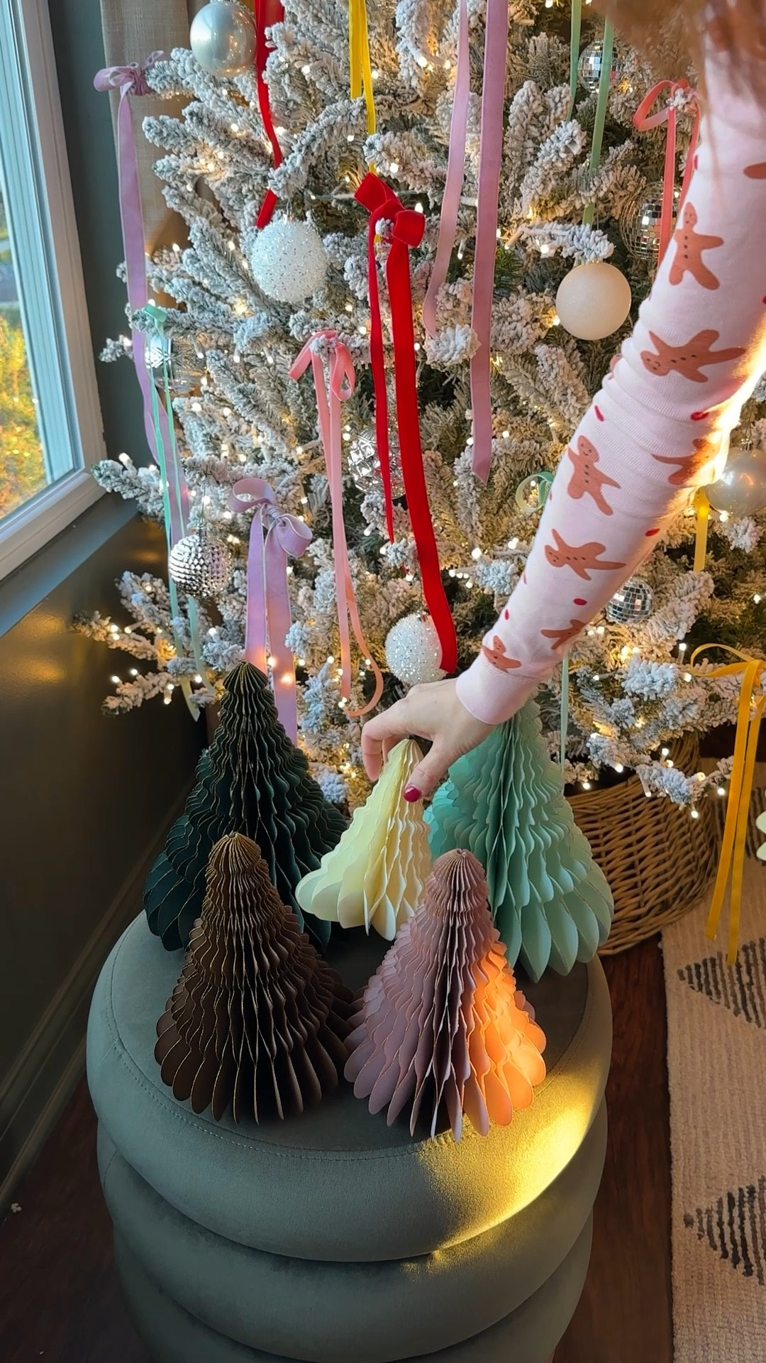 Let’s decorate a vintage inspired Christmas tree! #ad I used velvet ribbon from @amazon to create this look. I also used I used disco ball ornaments for extra sparkle.

You’ll want to use 3-4 feet of ribbon per bow to create long tails like this. Simply tie bows on the ends of the tree branches, spacing the colors evenly. Keep the velvet side of the ribbon facing out. So easy and it makes a big impact!

I’m also loving the look of these honeycomb paper Christmas trees. I found this set on Amazon and the colors match my tree ribbon perfectly. I decided to style them in our entryway to pull the whole look together.

Linking the exact ribbon I used, the honeycomb trees, and lots of other cozy and colorful holiday decorations from Amazon in my LTK shop.

Merry Christmas and happy decorating!

#fallfavorites2024 #amazonholiday

#LTKCyberWeek #LTKHome #LTKHoliday