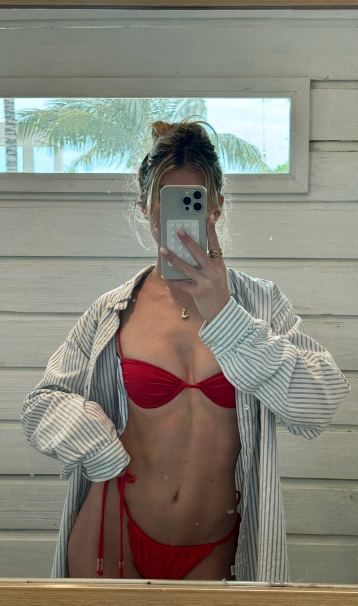 Beach day OOTD 🏖️

Beach outfits - summer fashion - summer swim - red bikini - swimsuit coverup - trendy fashion - blue and white stripe button up 

#LTKStyleTip #LTKSeasonal #LTKTravel