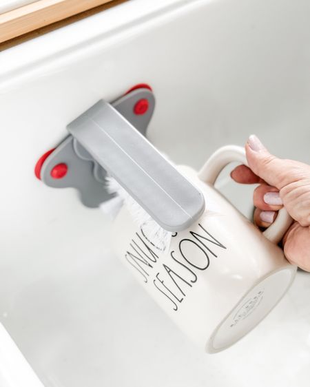 AMAZON FIND! This mug and glass scrubber fits by suction cup to your sink and help scrub your coffee cup clean.

#LTKfindsunder50 #LTKSeasonal #LTKhome