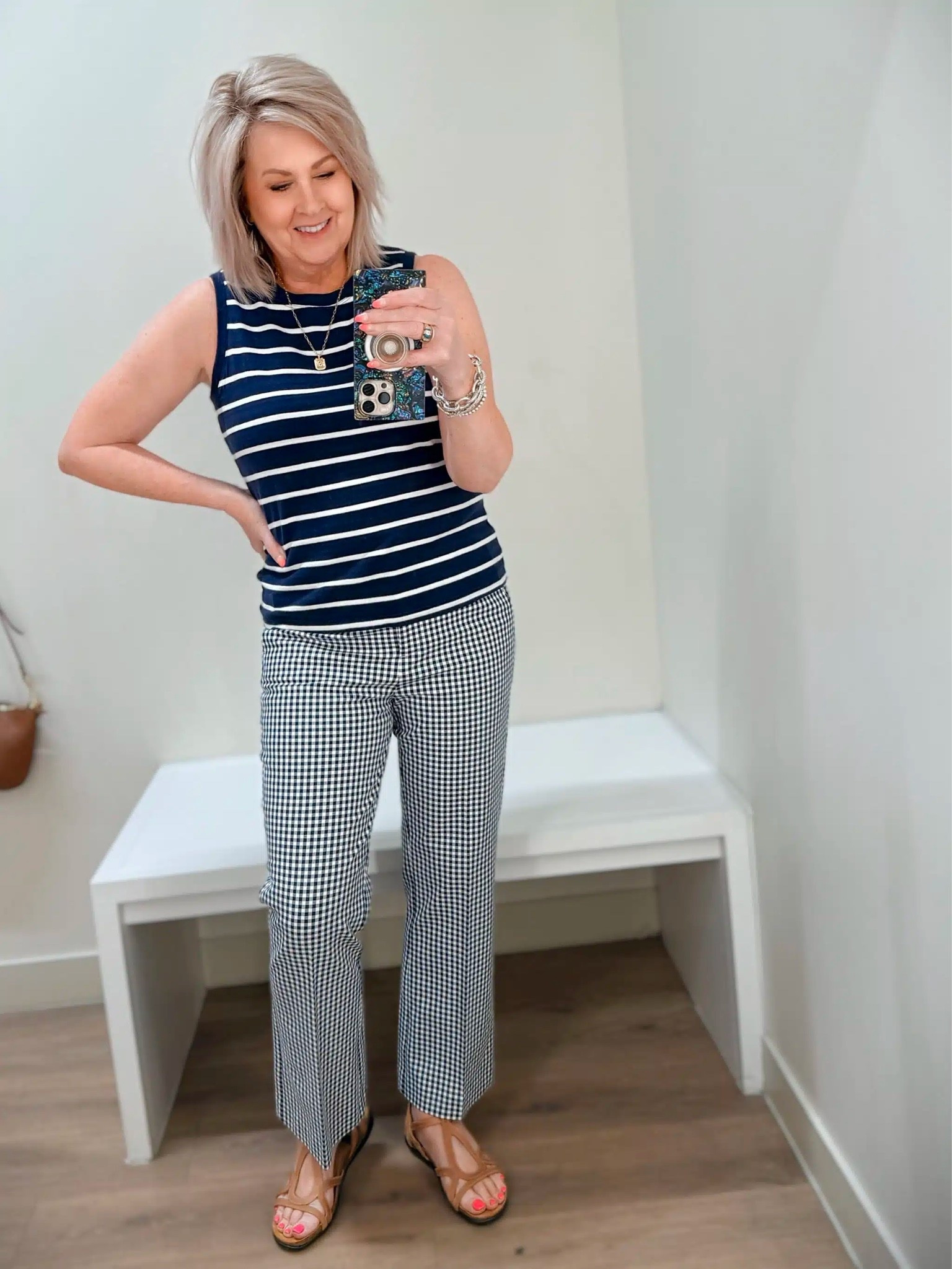 Workwear pieces with prints! These gingham printed pants are great on their own with a simple top, but I loved them with this striped top. My tank is a size medium and pants are size 10.

#LTKWorkwear #LTKOver40 #LTKMidsize