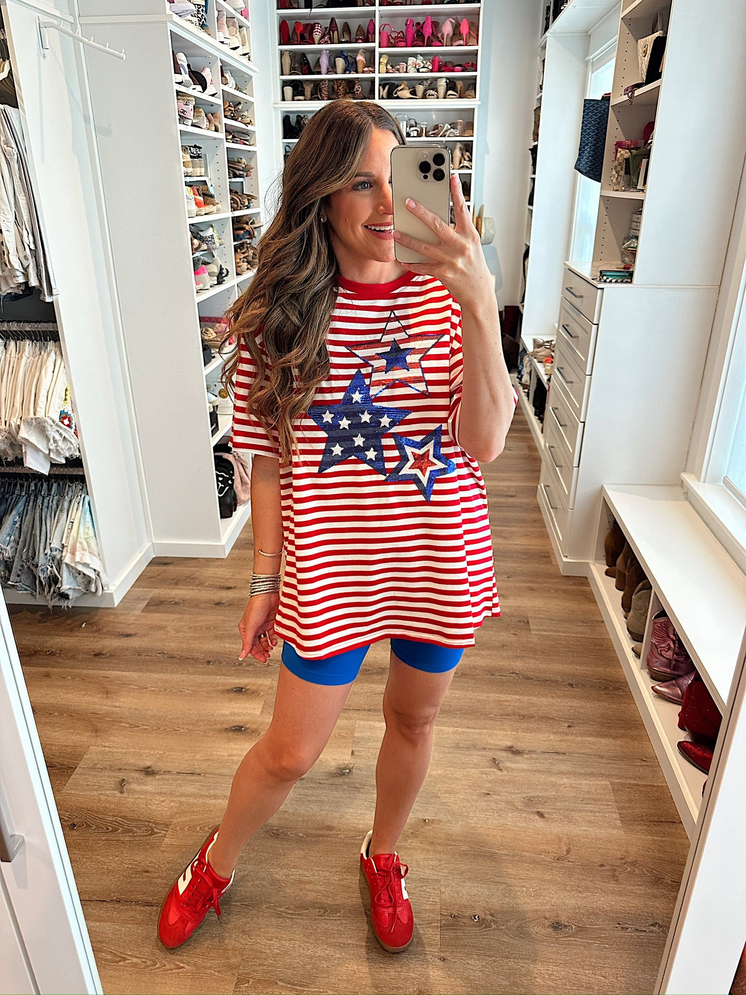 In a large sequin star stripe tee, small biker shorts, sneakers and accessories for patriotic look - fits tts.

#LTKSeasonal #LTKFindsUnder50 #LTKStyleTip