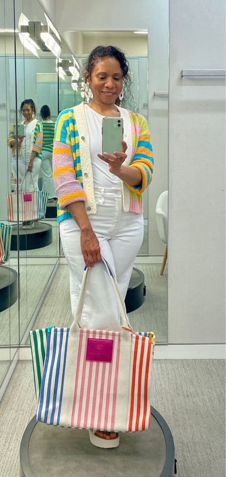In this look, I am wearing a white swimsuit layered under this colorful striped cardigan and white straight leg jeans. I have on a pair of comfy & stylish Tevas and am carrying a large beach tote. Perfect for a day at the beach! #modestfashion #modeststyle #springmodestfashion #springmodestsryle

#LTKitbag #LTKstyletip #LTKSeasonal