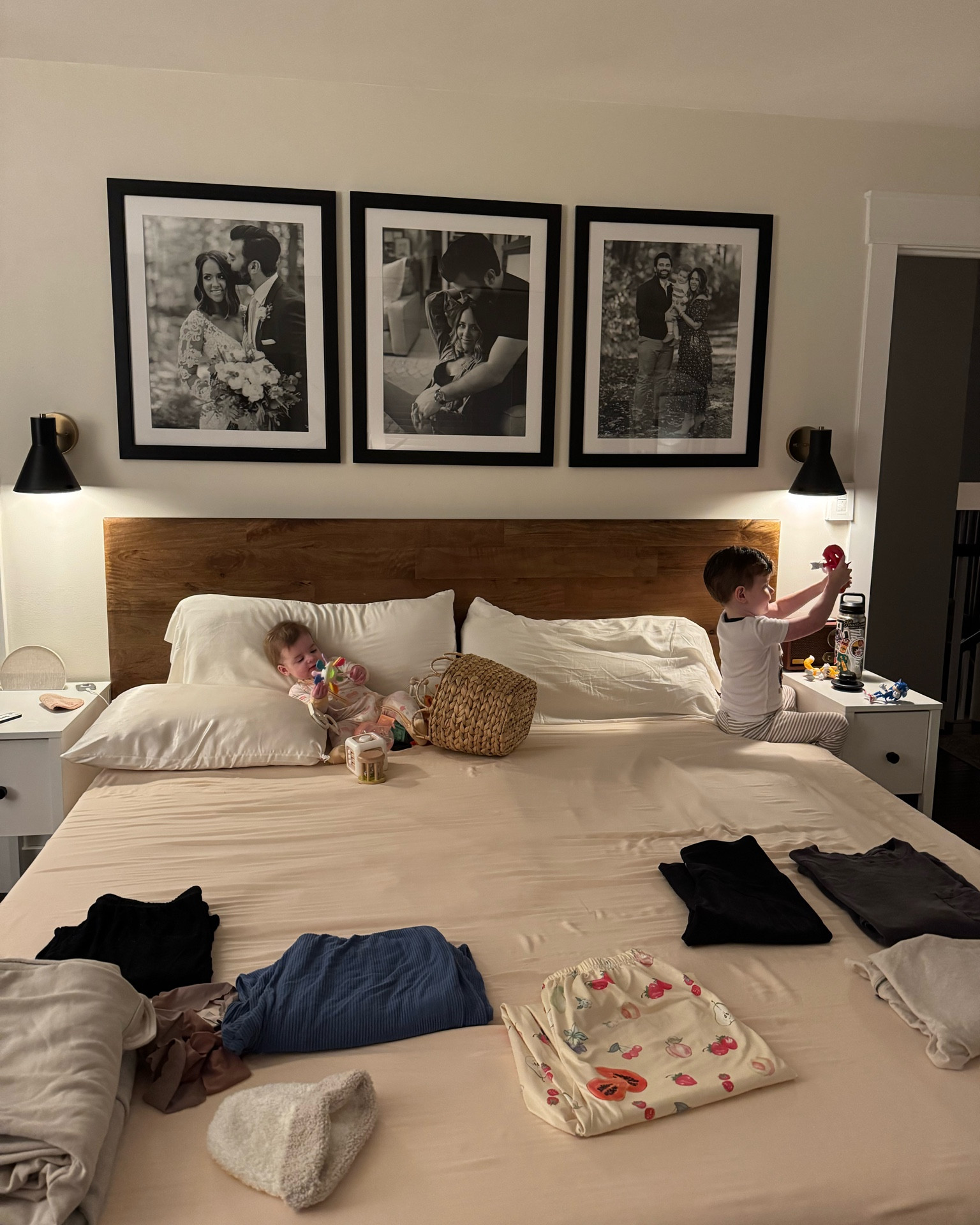 Quiet nights with the babies 🥹 linking our bed frame and our sconces! Yesterday was bedding wash day so took advantage and just did all the laundry!

King bed frame, west elm, black sconces, Amazon home, Amazon home faves 

#LTKHome #LTKFindsUnder100 #LTKFamily