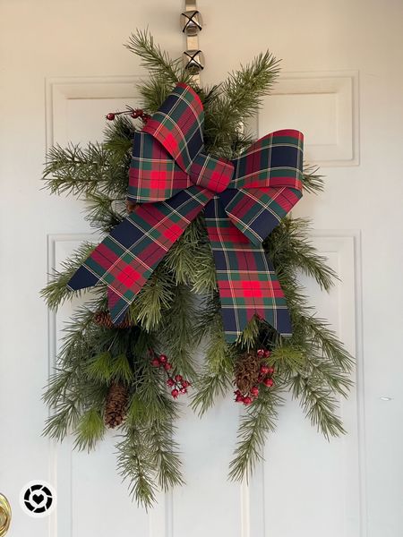 A swag is just as beautiful as a Christmas wreath. Add bells and a plaid bow! 

#LTKHoliday #LTKSeasonal #LTKhome