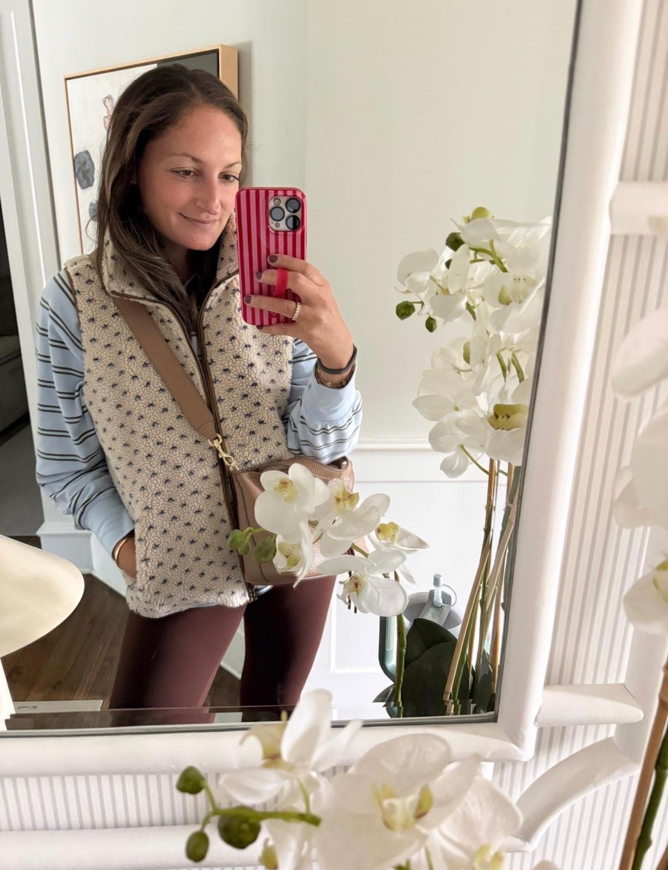 This vest sells out so quickly each year but was just restocked! Promise you it’s the coziest thing you’ll ever wear and looks so cute. This year, I grabbed the hooded jacket version too!! Runs true to size (I have a medium).