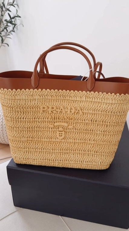 My newest summer bag 
Beautiful and of amazing quality 😍
Rafia tote 
Straw bag 
Designer bag 
Prada bag

#LTKU #LTKSeasonal #LTKootd
