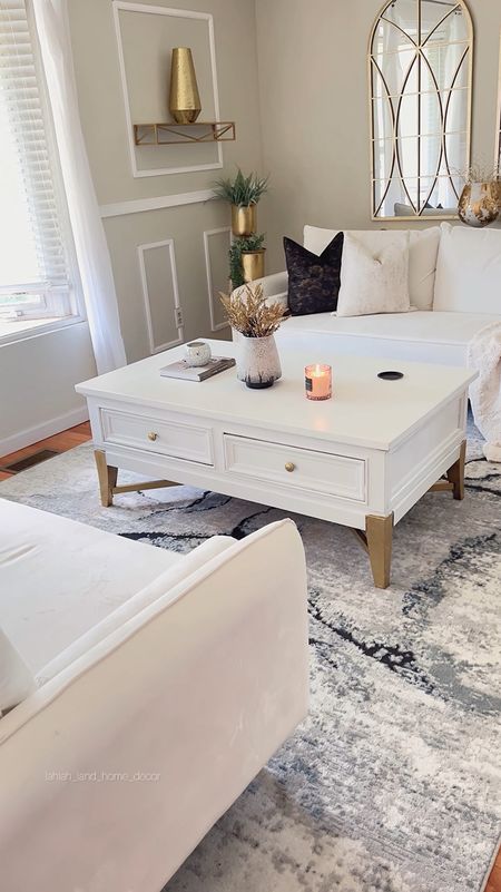 Save 59% off my abstract living room rug! Living room inspo on a budget! White sofa | white coffee table | gold arch mirror | gold home accents | neutral throw pillows | throw blanket | abstract rug 


#LTKHome #LTKFamily #LTKSaleAlert