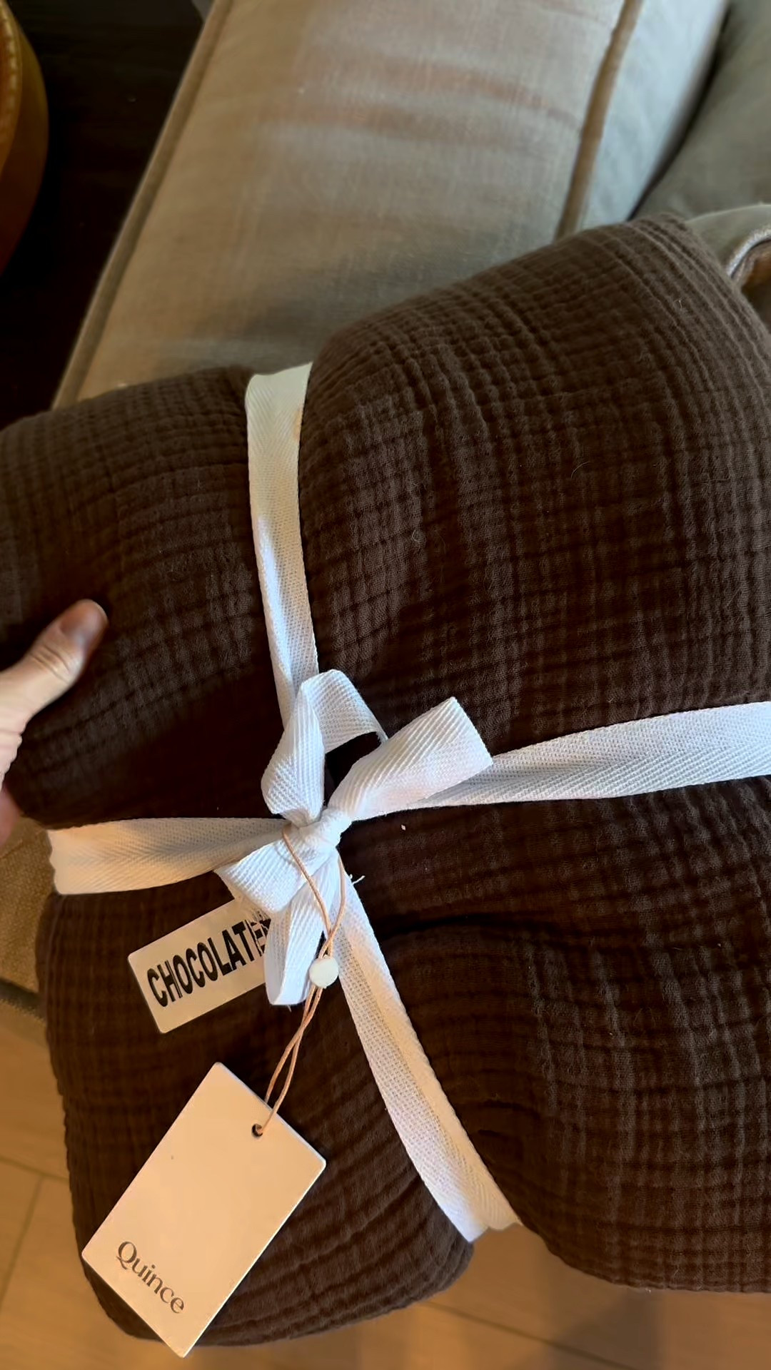 @onequince launched my favorite organic cotton blanket in this stunning brown color!perfect for end of bed, or styled on a sofa or accent chair! #quincepartner

#LTKmorningroutine #LTKHome #LTKSaleAlert