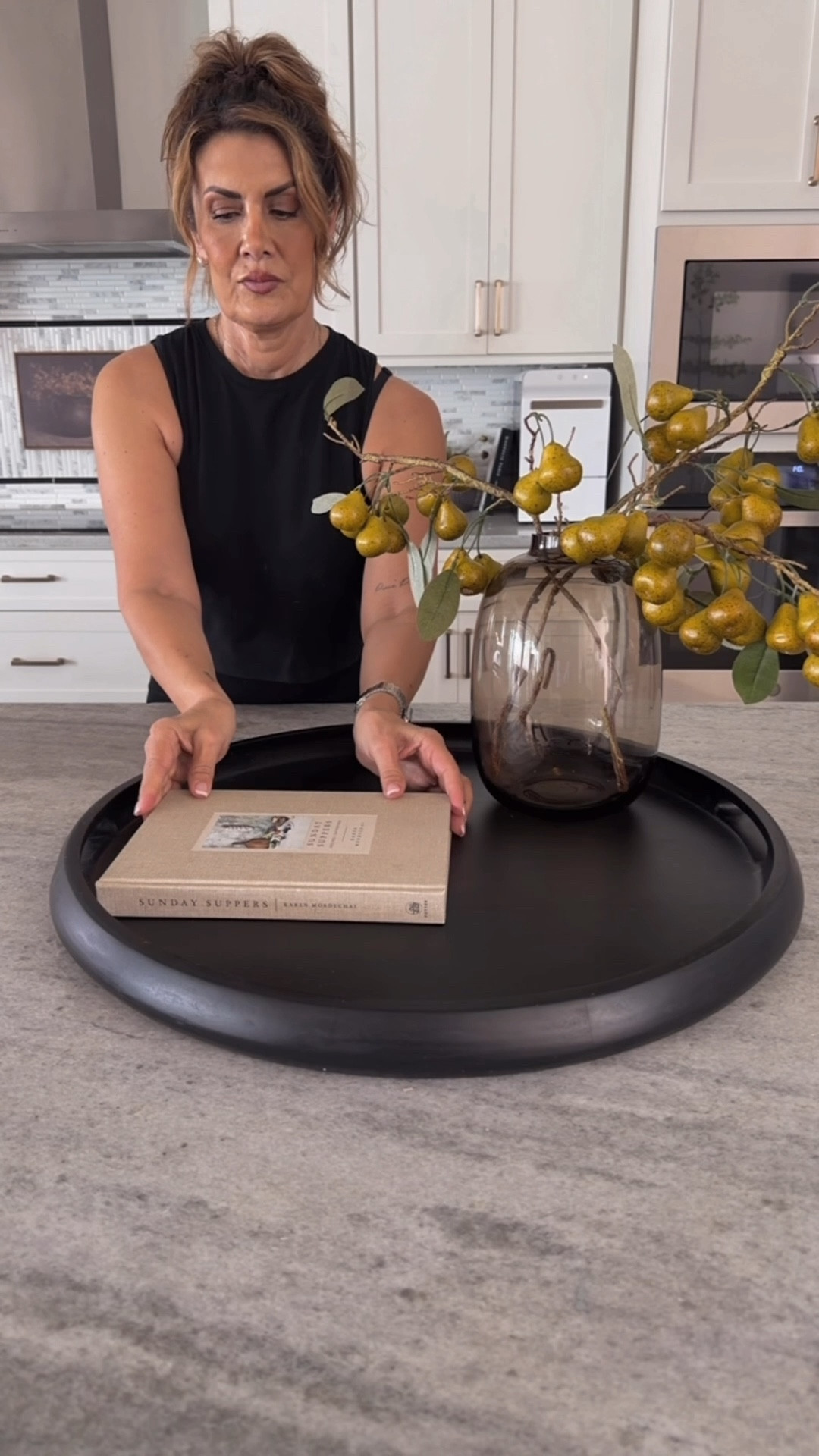 Spring Tray Styling
Round black tray, faux pear stems, brown glass vase, marble catch all, transitional home, modern decor, amazon find, amazon home, target home decor, mcgee and co, studio mcgee, amazon must have, pottery. barn, Walmart finds, affordable decor, home styling, budget friendly, accessories, neutral decor, home finds, new arrival, coming soon, sale alert, high end look for less, Amazon favorites, Target finds, cozy, modern, earthy, transitional, luxe, romantic, home decor, budget friendly decor #amazonhome




#LTKHome #LTKSeasonal