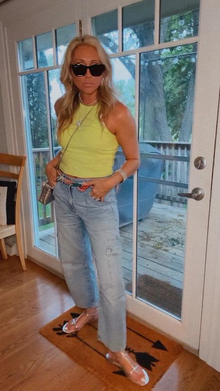 Pops of colors and jewelry make any outfit stand out… I just need the weather to cooperate so I stay out in it…favorite tank and style denim with a fun belt and layers of jewelry… silver adds a fun metallic tone that elevates the entire basic look… edgy styling this Friday… happy to have the weekend! Use code LINDSAY on any Melinda Maria jewelry… do many new pieces too… jeans, tank, sandals, summer outfit, jewelry, discount, belt, Anthropologie, free people 

#LTKStyleTip #LTKVideo #LTKSeasonal