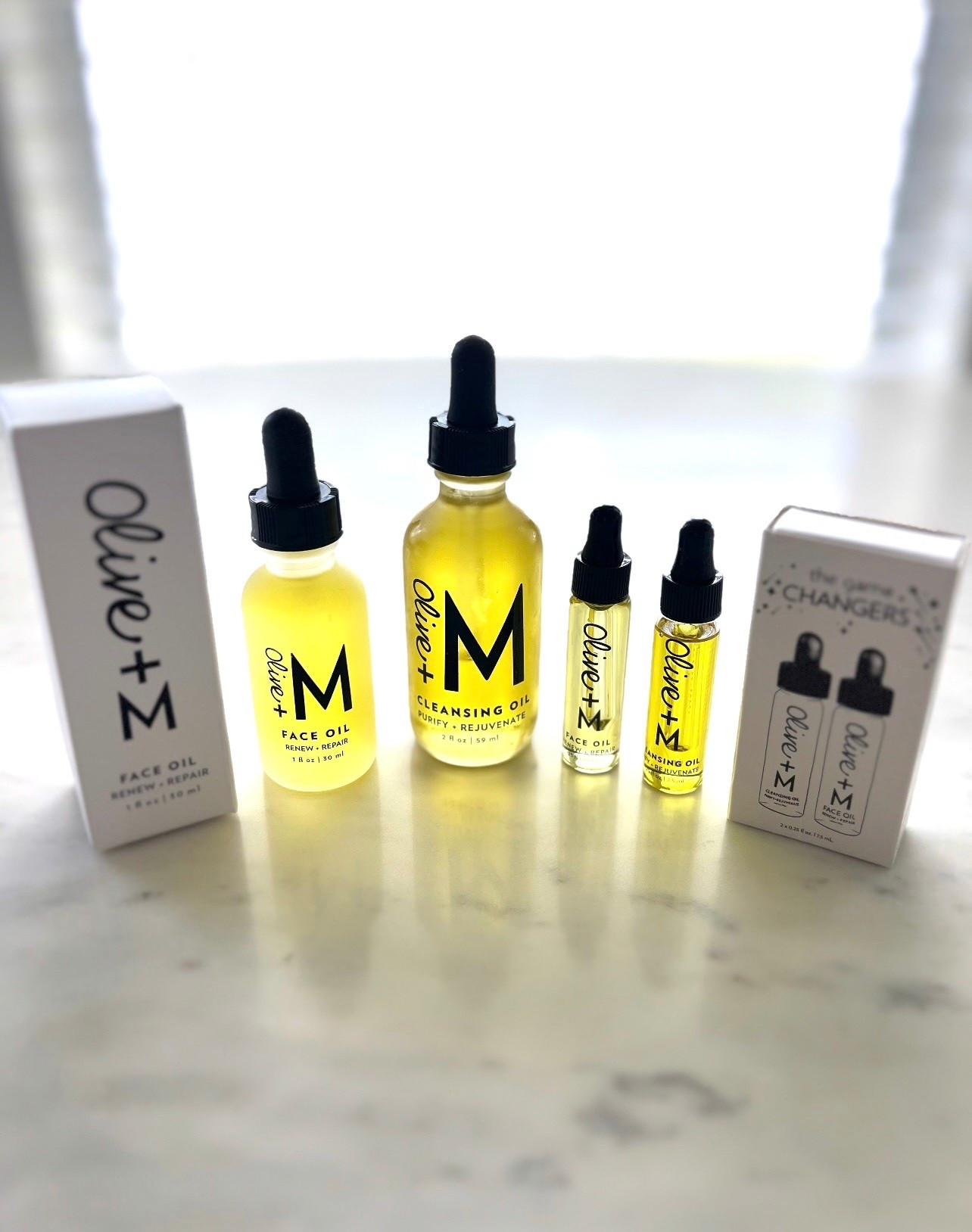 🤍OLIVE + M SKINCARE: #ad Feed your skin what it’s asking for. 100% natural ingredients. @olive_and_m #oliveandm

1.) Purify + Rejuvenate Cleansing Oil: Daily Cleanse

🤍This blend of olive and plant-based oils clears the day from your skin without stripping what your skin spent all day building. Makeup, sunscreen, environmental residue — gone. 

🤍How to Use:
Morning or evening cleanse
Press a warm washcloth to face first to open pores
Work 2–4 drops into skin with fingertips
Remove excess oil with a warm washcloth
Follow with Face Oil for added nourishment

🤍Great for removing makeup and sunscreen, or as a shave oil, reducing ingrown hairs and skin irritations. 

Key Ingredients:
Olive oil
Castor seed oil
Hemp seed oil 
Sunflower seed oil

2.) Renew + Repair Face Oil: Daily nourishment

🤍This blend of cold-pressed Tunisian olive oil, natural plant-based oils and botanical extracts that are rich in antioxidants, vitamins, omegas, and amino acids. Not a treatment. Not a correction. Just the nourishment your skin needs to renew and repair itself. 

🤍How to Use:
Morning and evening, after cleansing
Apply to damp face and neck in circular motions
2–3 drops for dry or mature skin
1–2 drops for combination or oily skin
Use after Cleansing Oil for deeper nourishment

Key Ingredients:
Olive oil
Pomegranate seed oil
Rosehip oil
Red raspberry seed oil 

Particularly helpful for eczema and psoriasis.

🤍Love that these oils come in a convenient travel size too.

#LTKBeauty #LTKTravel #LTKselfcare