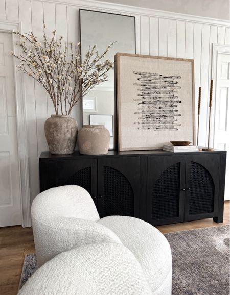 Sideboard on sale, console table, living room, wall mirrors, artwork, vases, spring stems, accent chairs, swivel chair, rug 

#LTKHome #LTKStyleTip