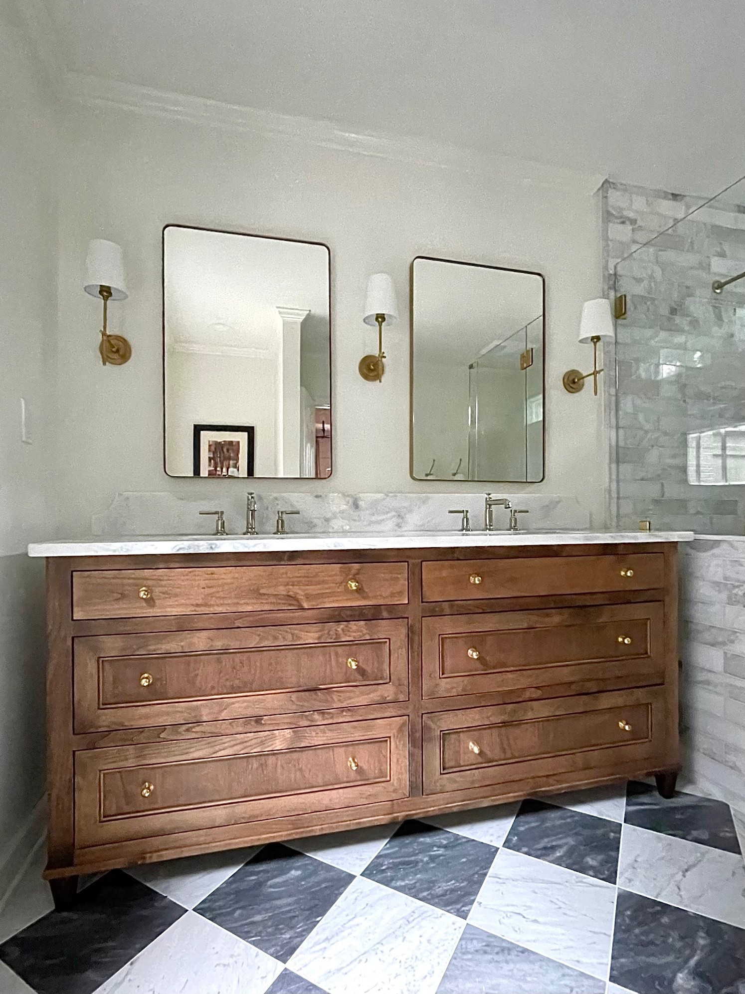 A beautiful bath remodel project we finished up last year!  

Bath remodel, master bathroom makeover, bath hardware, bathroom sconces, brass sconces, visual comfort, bathroom mirrors, Mable flooring, cabinet hardware 

#LTKHome #LTKSaleAlert