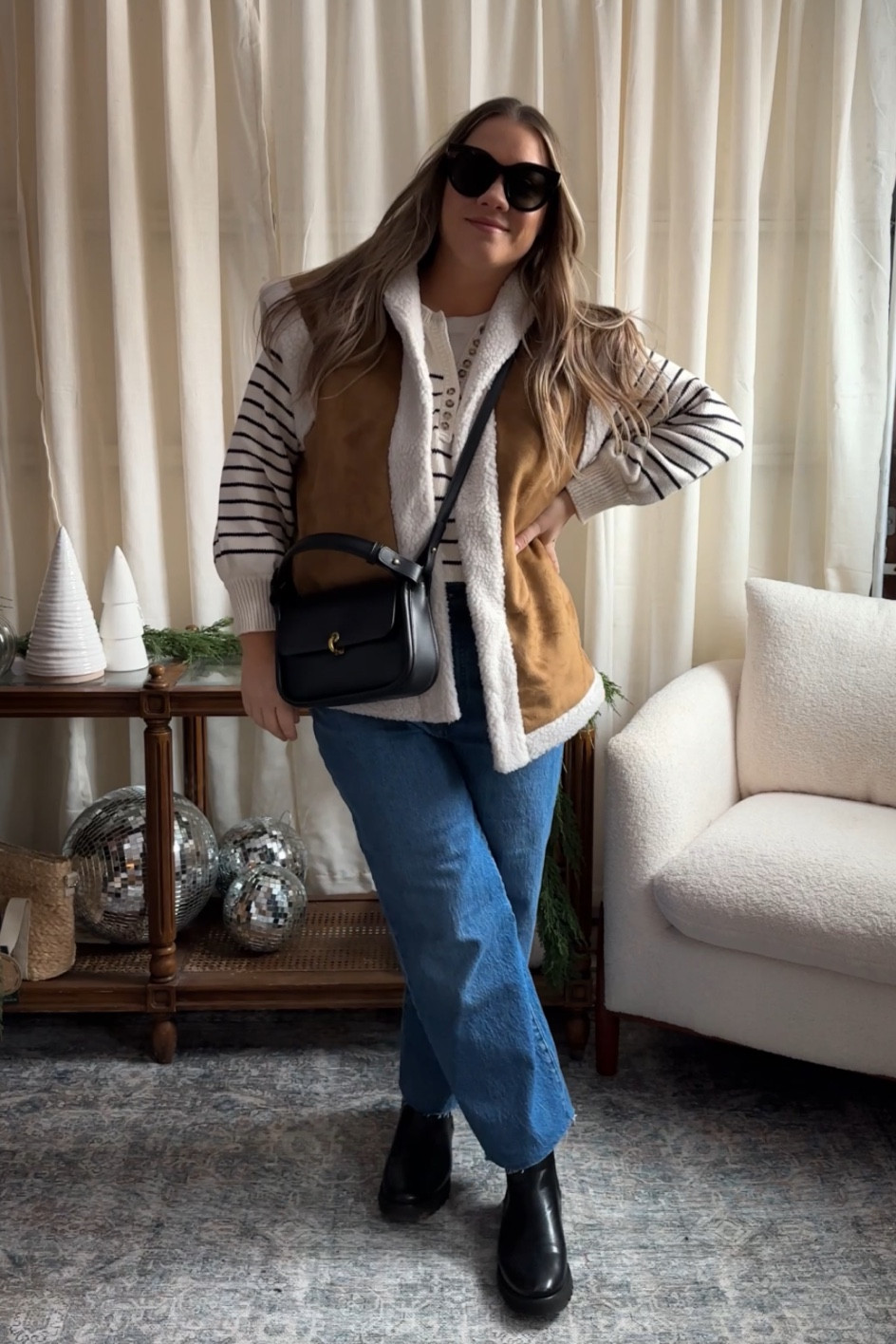 Sized up in the vest
Size down in the jeans
Size up in sweater 