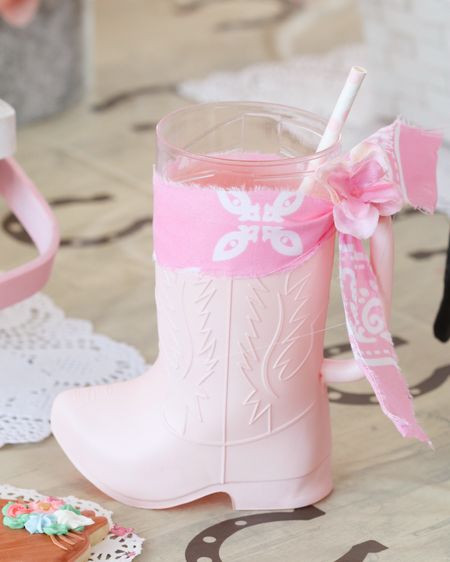 DIY Cowgirl Boot Mugs
 Looking for a unique cup for a little coquette cowgirl? You’ll love this quick glow up to a clear boot mug for my daughter’s cowgirl, rodeo themed party! Of course you could also add BOWS 🎀 around the top, for even more coquette style! 
 #cowgirlparty #birthdaypartyideas #beyonce#myfirstrodeo  #myfirstrodeoparty   #myfirstrodeobirthdayidea  #myfirstrodeopartyidea  #myfirstrodeoideas   #myfirstrodeotheme
#rodeoparty #westernparty #westerntheme #cowgirl #letsgogirls
#party #birthday #partyideas #birthdaypartyideas #horseparty #cowgirlparty #partydecor
#rodeoparty #cowgirlchic #moderncowgirl #cowgirlpartytheme


#LTKfamily #LTKkids #LTKparties