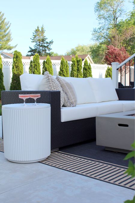 Cooler side table, outdoor rug, outdoor sofa, concrete fire pit, pillows 

#LTKHome #LTKSeasonal #LTKStyleTip