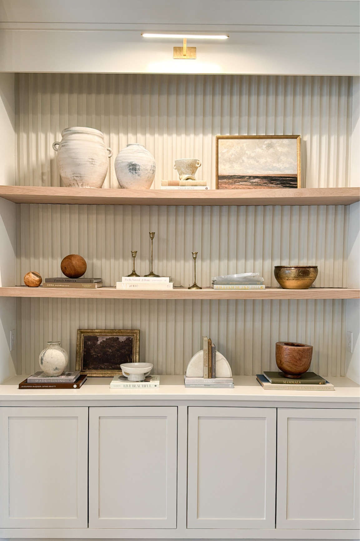 Living room shelf styling, coffee table books, living room light, bookcase shelf, home decor // 

#LTKhome #LTKstyletip #LTKfindsunder50