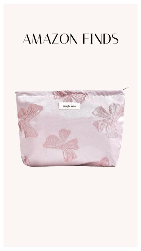 A new Amazon find that I’m loving is this cosmetic bag. The pink bow print is so fun and girly and perfect for spring. It holds my everyday makeup perfectly. 

#LTKbeauty #LTKfindsunder50 #LTKitbag
