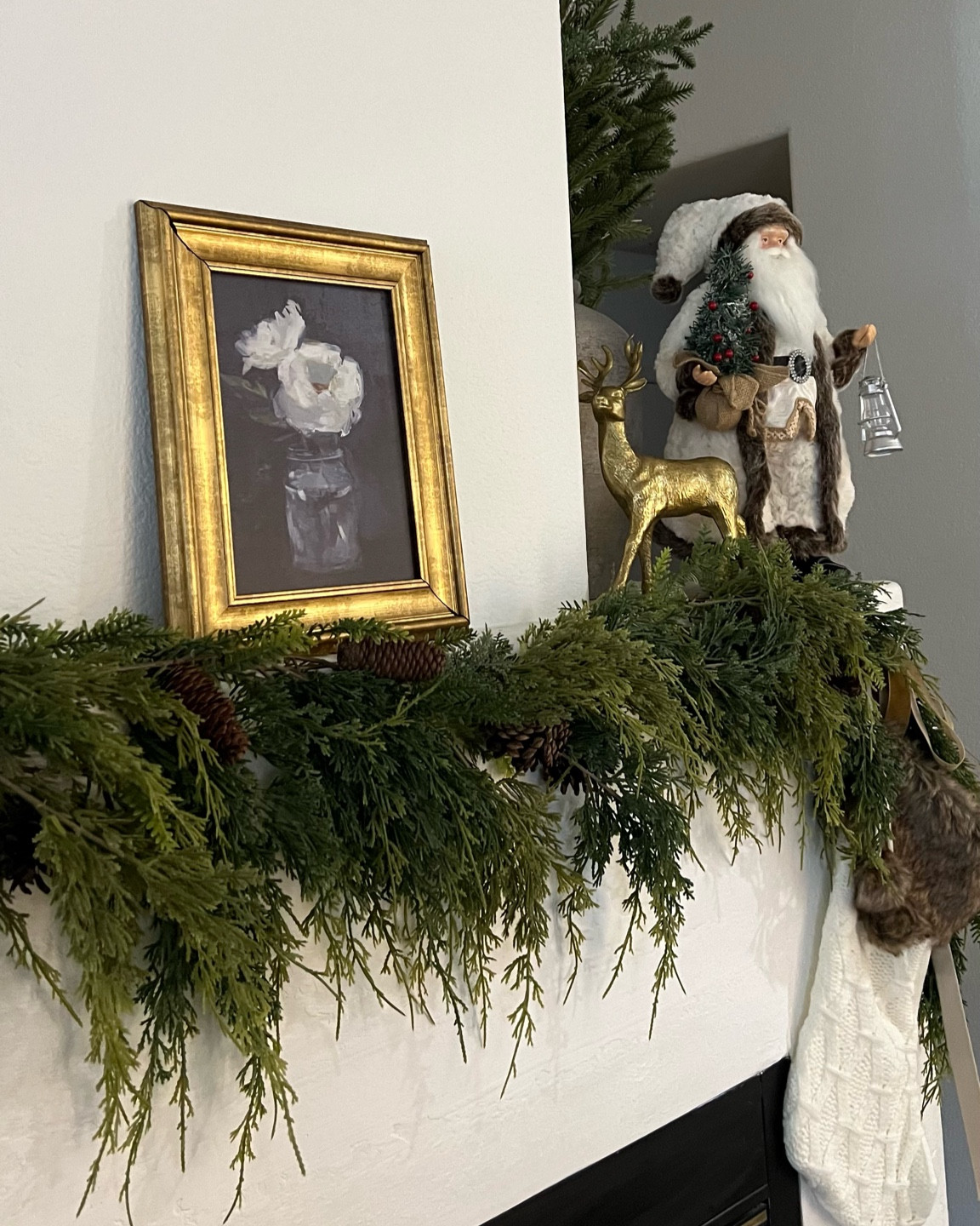 Realistic green garland (these are two layered together)

#LTKHoliday #LTKSeasonal #LTKhome