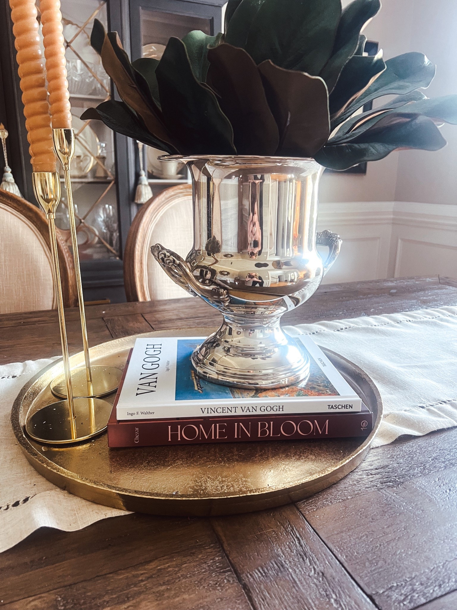 We love using books to add height to decor. This one is so pretty 

#LTKvlog #LTKHome #LTKSeasonal