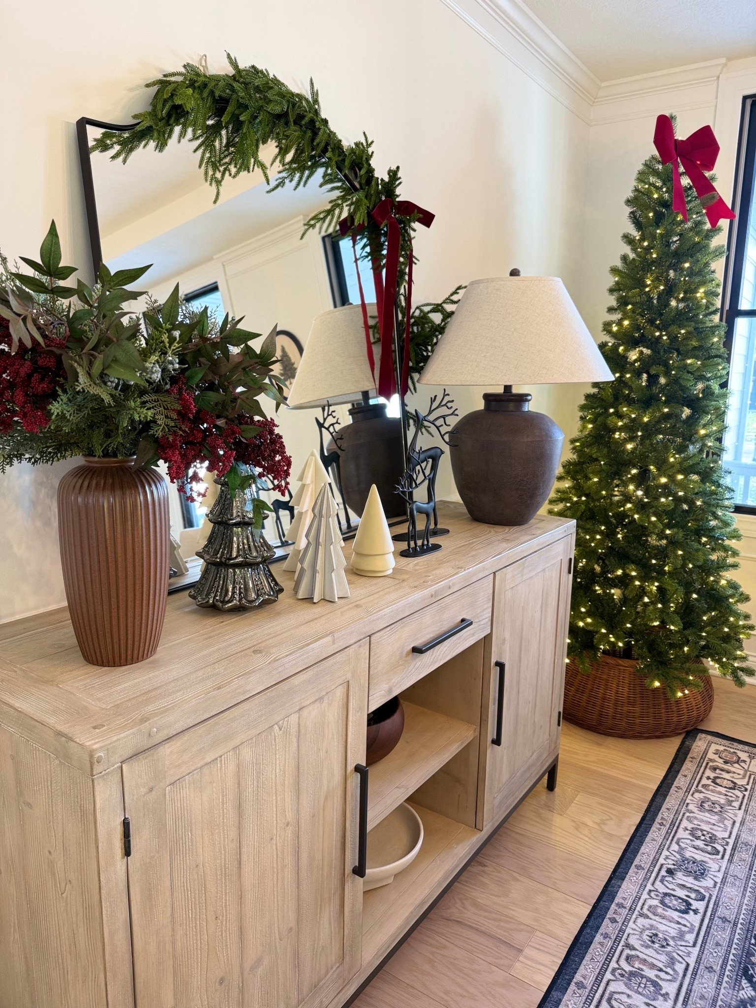 Dining room sideboard/buffet Christmas decor! This Christmas tree usually goes in my bedroom, but I love it here!! 

#LTKHoliday #LTKHome #LTKSeasonal