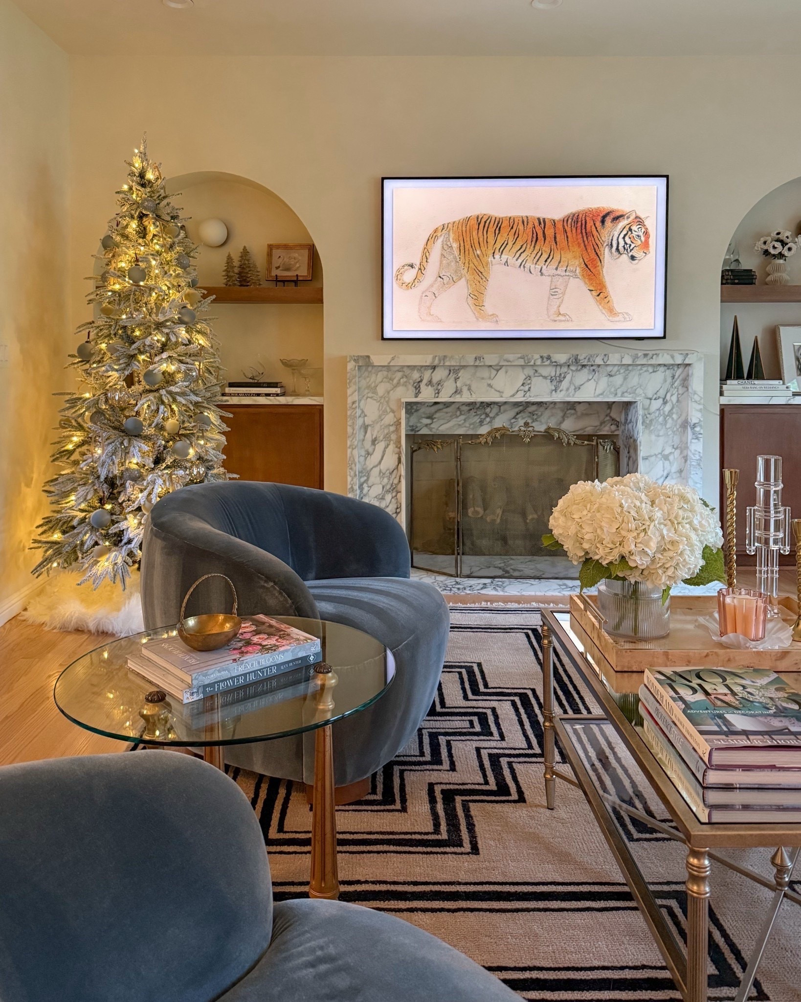 Christmas in the Parlor 🤍 went with a flocked tree in this space and some subtle winter glam decor ✨

#LTKHoliday #LTKFindsUnder100 #LTKHome