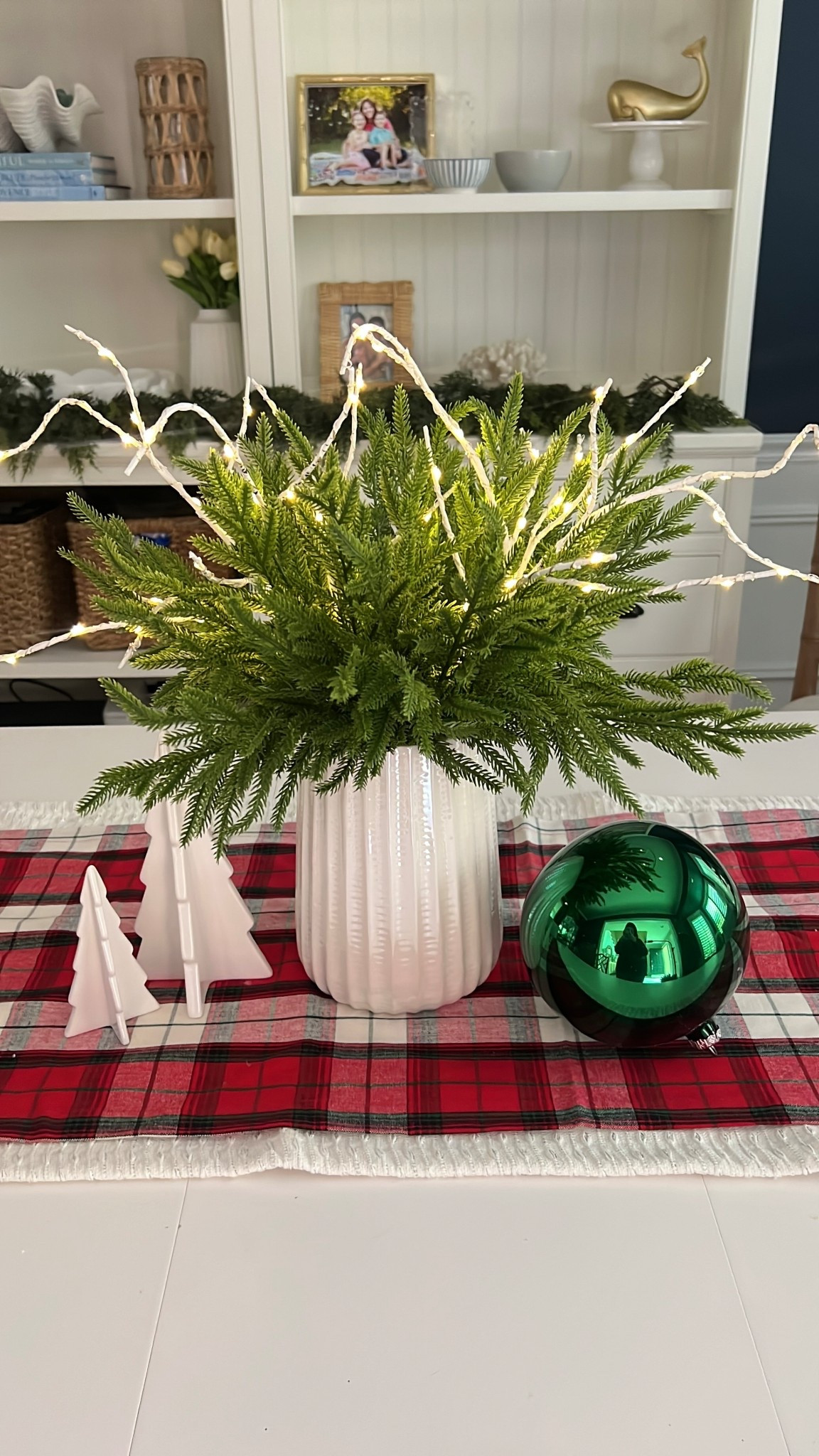 The holiday tablescape is officially set! Time to gather this tartan table runner, some small Christmas tree decor pieces, and faux greenery.

table setting, hosting tips, entertaining at home, decorating hacks, winter season, christmas ornaments, DIY decor, dining table inspo

#LTKHome #LTKFindsUnder50 #LTKSeasonal