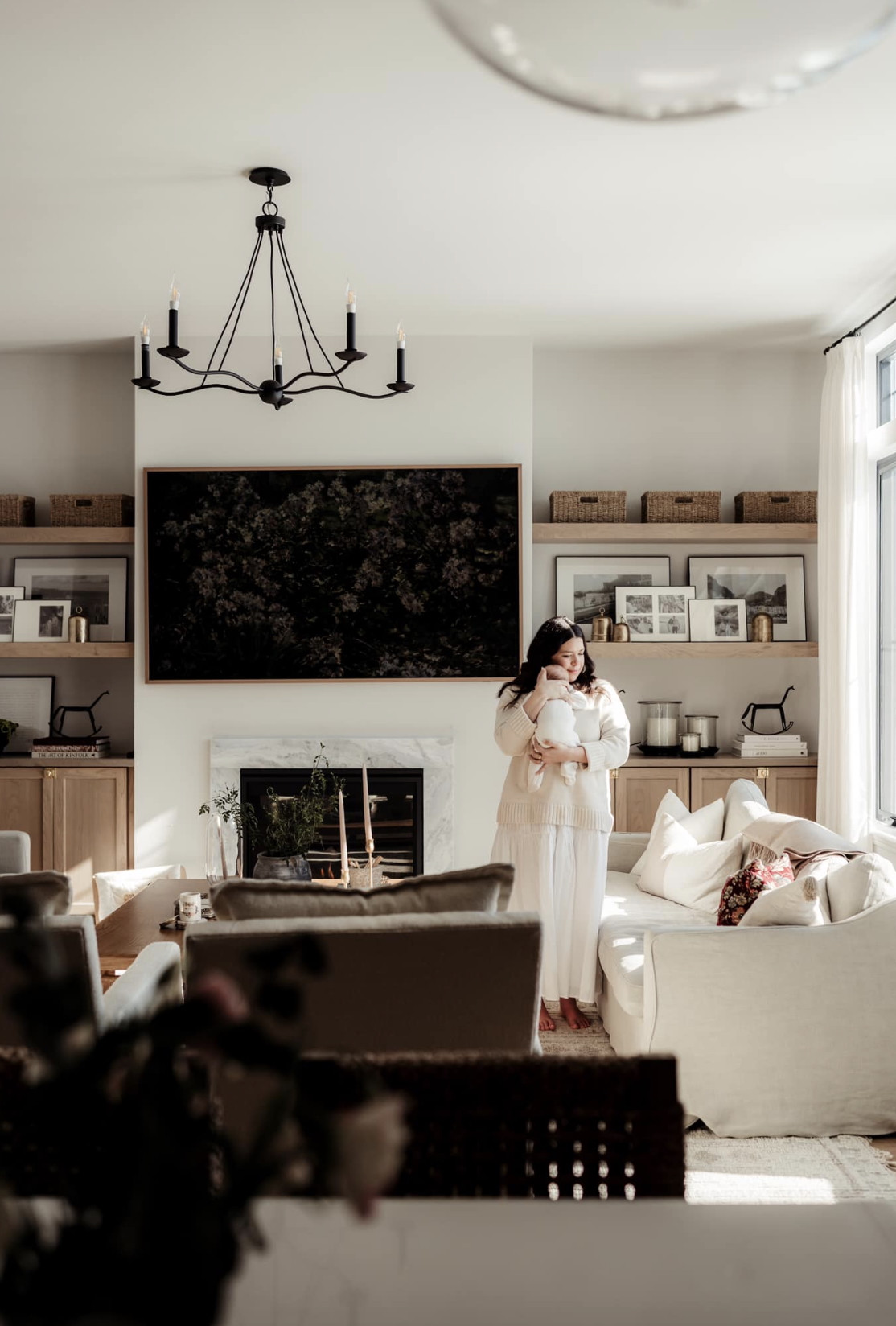 Shop everything in our living room! // Wall color: First Star by Sherwin Williams // Flooring: Coretec LVP in Springfield Oak // Cabinets: Custom by Countryside Cabinets in North Pier // Items Not Linked: Couches by Sixpenny in Jasmine Rice 

 #LTKHome #LTKBaby