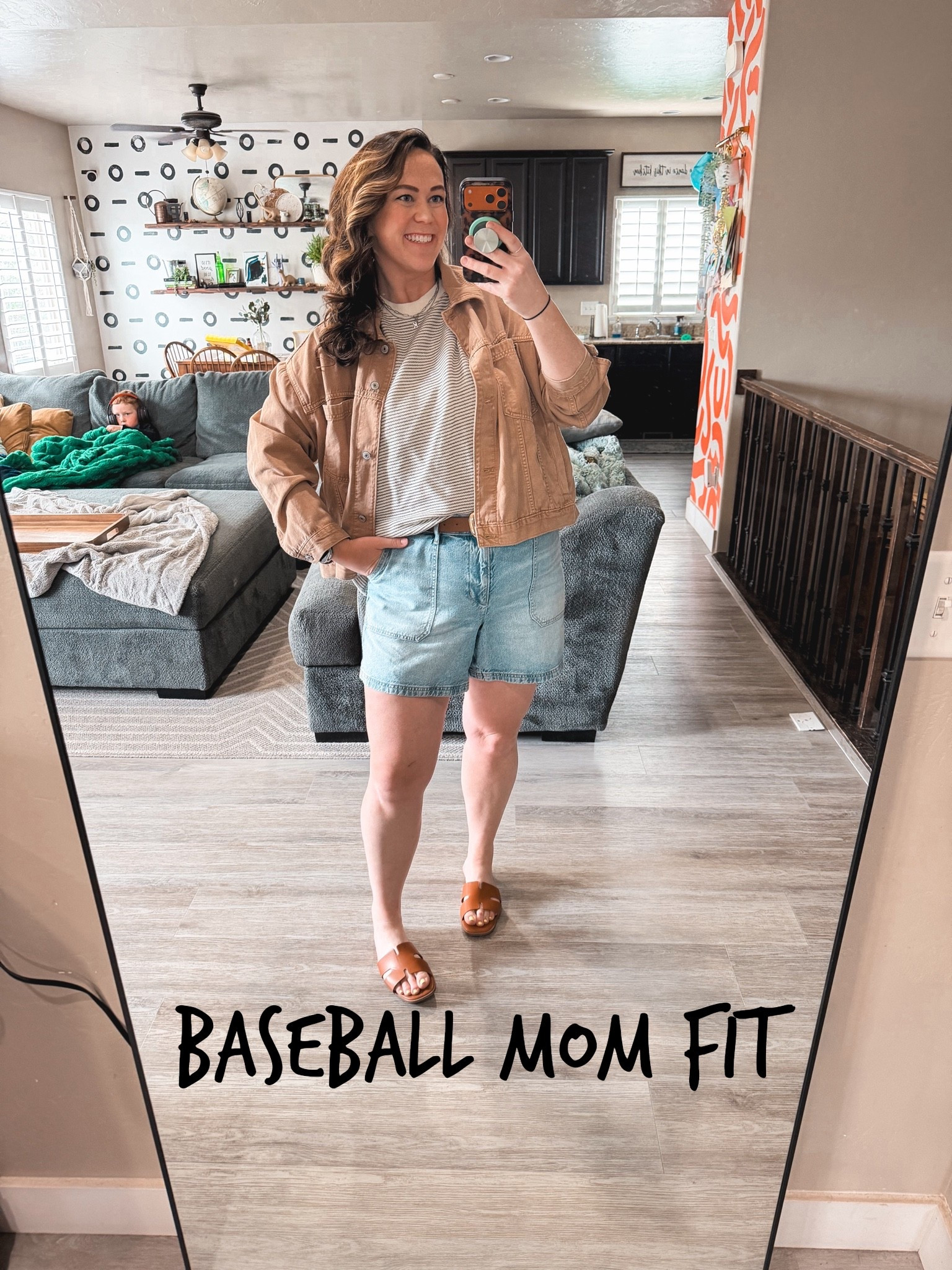 Baseball mom but make it cute 😂⚾️ Striped tee, tan jacket, light wash AE denim shorts, and brown slide sandals, and yes there is a child in a gaming headset in the background living his best life 😂

Shirt XL @American Eagle Outfitters 
Shorts 16 @American Eagle Outfitters 
Jacket Large @American Eagle Outfitters 

Size 14/16 | L/XL | 5’9

American Eagle denim shorts size 16, AE light wash shorts midsize, tan jacket outfit, striped tee outfit midsize, baseball mom style, sports mom outfit, casual summer midsize, brown slide sandals Amazon, denim shorts and jacket outfit, AE midsize summer look

#LTKMidsize #LTKTall #LTKmomlife