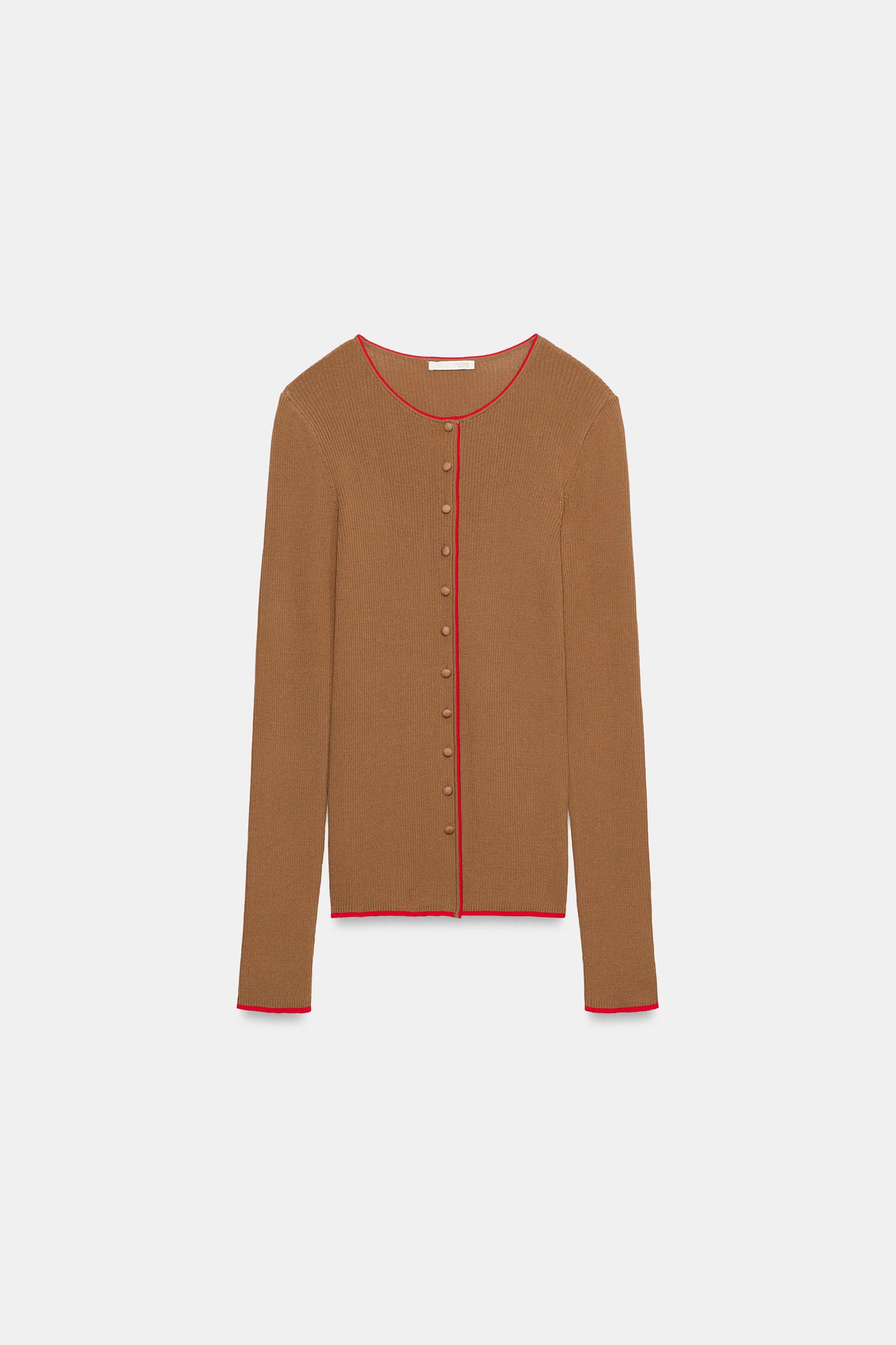 Round neck cardigan with long sleeves. Featuring contrast trim detail. Front button fastening. | Zara UK