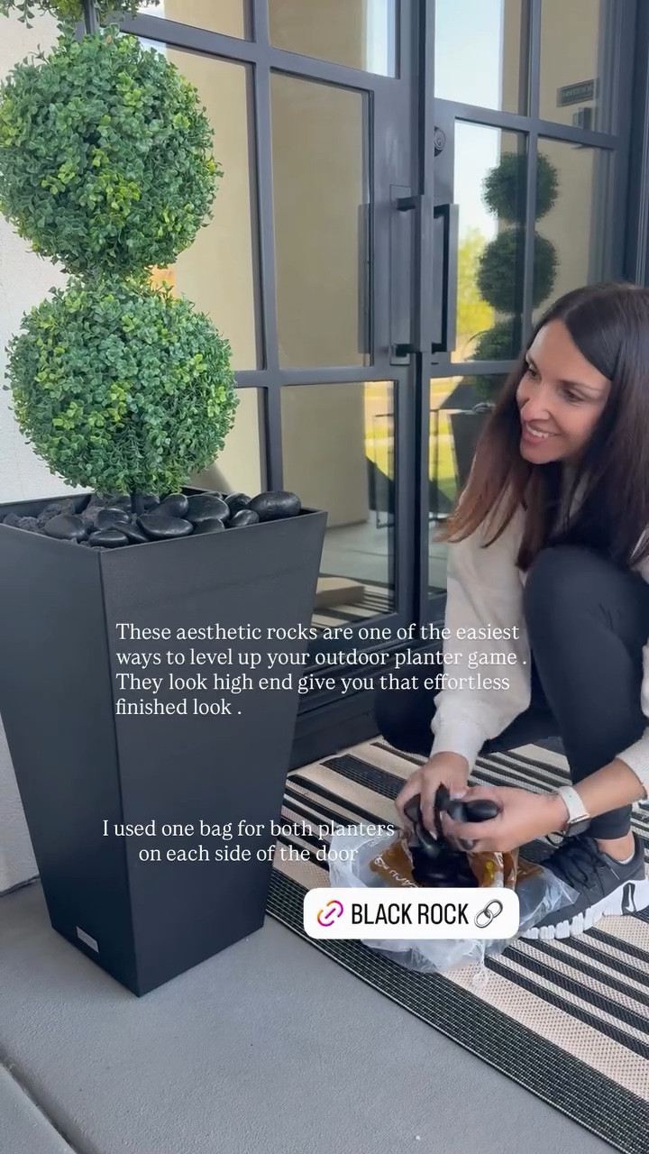 These aesthetic rocks are one of the easiest ways to level up your outdoor planter game . They look high end give you that effortless finished look . I used one bag for both planters on each side of the door